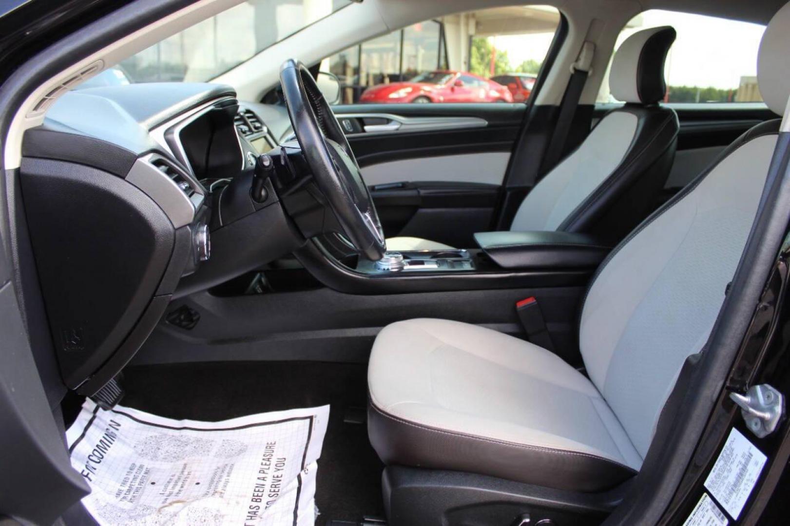 2019 Black Ford Fusion SE (3FA6P0HD6KR) with an 1.5L L4 DOHC 16V engine, 6A transmission, located at 4301 NW 39th , Oklahoma City, OK, 73112, (405) 949-5600, 35.512135, -97.598671 - NO DRIVERS LICENCE -NO FULL COVERAGE INSURANCE - NO CREDIT CHECK. COME ON OVER TO SUPERSPORTS, TAKE A LOOK AND TEST DRIVE. PLEASE GIVE US A CALL AT (405) 949-5600. NO LICENCIA DE CONDUCIR - NO SEGURO DE COBERTURA TOTAL - NO VERIFICACION DE CREDITO. VISITENOS EN SUPERSPORTS, MIRE NUESTRO - Photo#17