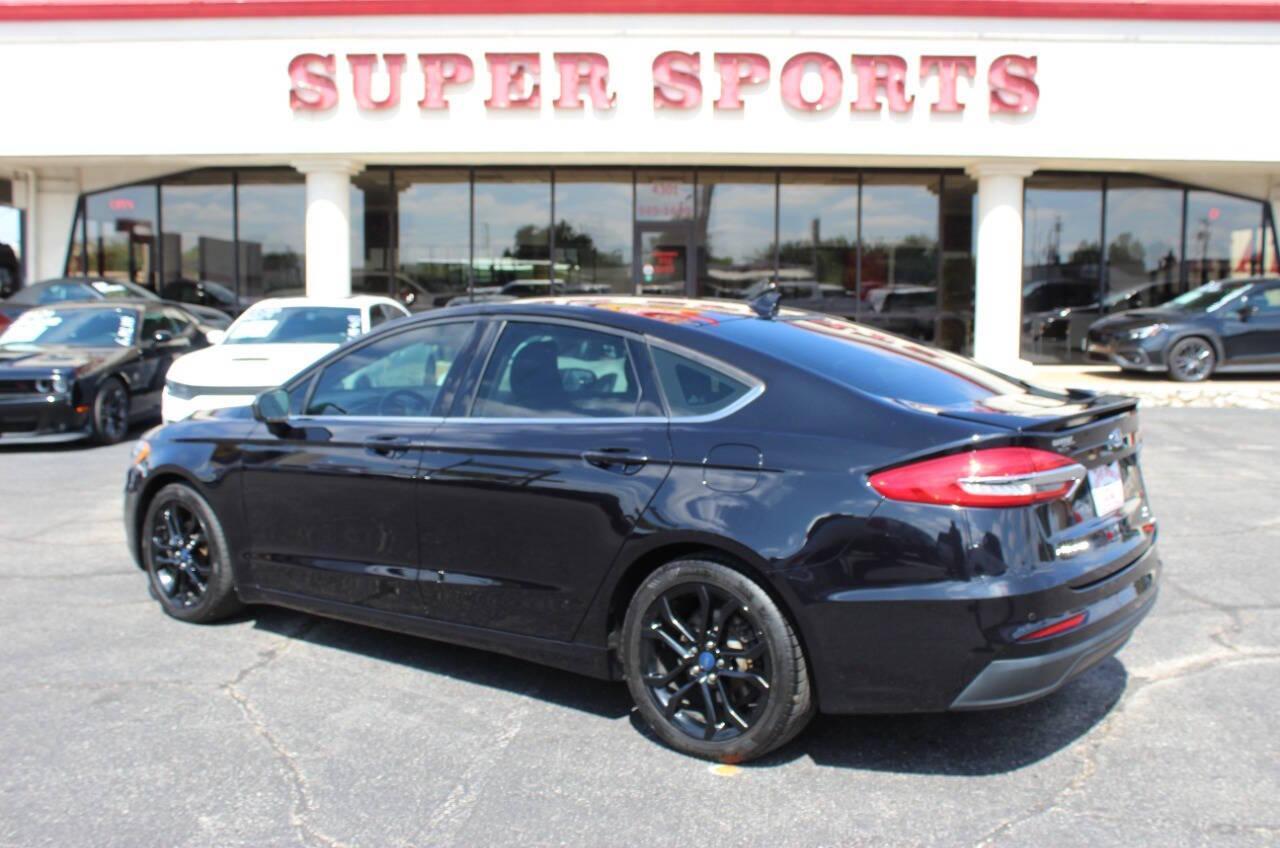 2019 Black Ford Fusion SE (3FA6P0HD6KR) with an 1.5L L4 DOHC 16V engine, 6A transmission, located at 4301 NW 39th , Oklahoma City, OK, 73112, (405) 949-5600, 35.512135, -97.598671 - NO DRIVERS LICENCE -NO FULL COVERAGE INSURANCE - NO CREDIT CHECK. COME ON OVER TO SUPERSPORTS, TAKE A LOOK AND TEST DRIVE. PLEASE GIVE US A CALL AT (405) 949-5600. NO LICENCIA DE CONDUCIR - NO SEGURO DE COBERTURA TOTAL - NO VERIFICACION DE CREDITO. VISITENOS EN SUPERSPORTS, MIRE NUESTRO - Photo#4