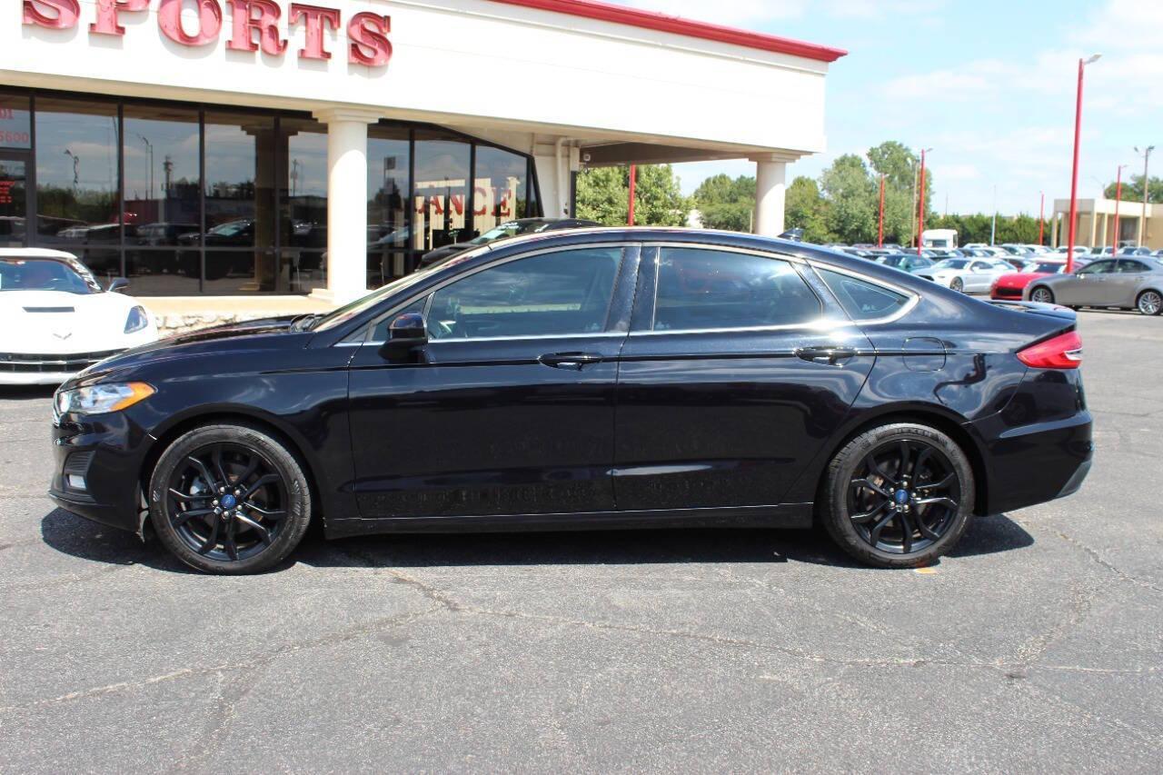 2019 Black Ford Fusion SE (3FA6P0HD6KR) with an 1.5L L4 DOHC 16V engine, 6A transmission, located at 4301 NW 39th , Oklahoma City, OK, 73112, (405) 949-5600, 35.512135, -97.598671 - NO DRIVERS LICENCE -NO FULL COVERAGE INSURANCE - NO CREDIT CHECK. COME ON OVER TO SUPERSPORTS, TAKE A LOOK AND TEST DRIVE. PLEASE GIVE US A CALL AT (405) 949-5600. NO LICENCIA DE CONDUCIR - NO SEGURO DE COBERTURA TOTAL - NO VERIFICACION DE CREDITO. VISITENOS EN SUPERSPORTS, MIRE NUESTRO - Photo#5
