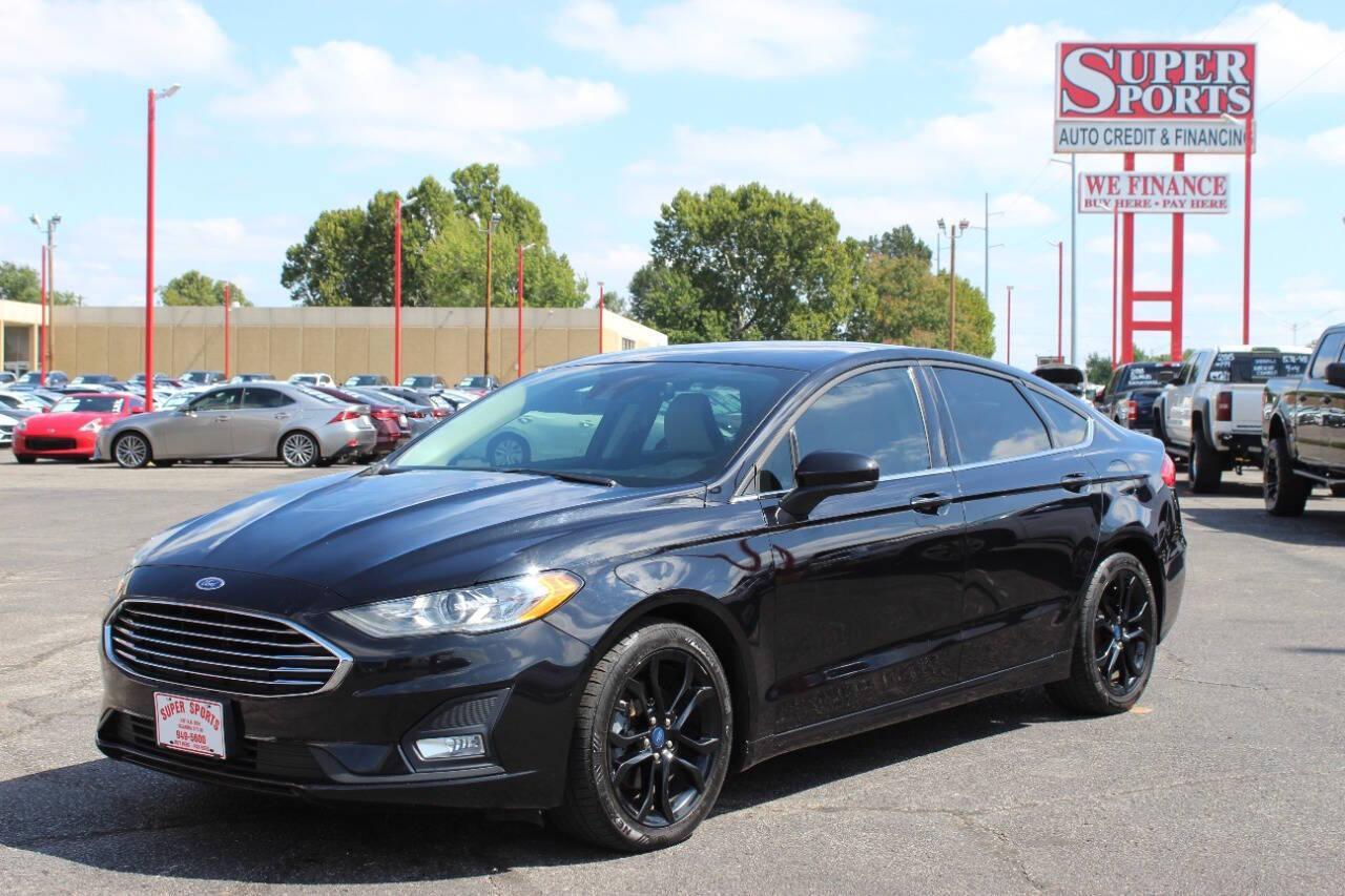 2019 Black Ford Fusion SE (3FA6P0HD6KR) with an 1.5L L4 DOHC 16V engine, 6A transmission, located at 4301 NW 39th , Oklahoma City, OK, 73112, (405) 949-5600, 35.512135, -97.598671 - NO DRIVERS LICENCE -NO FULL COVERAGE INSURANCE - NO CREDIT CHECK. COME ON OVER TO SUPERSPORTS, TAKE A LOOK AND TEST DRIVE. PLEASE GIVE US A CALL AT (405) 949-5600. NO LICENCIA DE CONDUCIR - NO SEGURO DE COBERTURA TOTAL - NO VERIFICACION DE CREDITO. VISITENOS EN SUPERSPORTS, MIRE NUESTRO - Photo#6