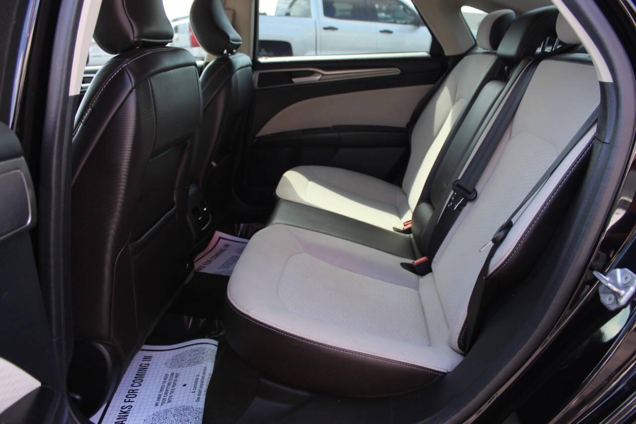 2019 Black Ford Fusion SE (3FA6P0HD6KR) with an 1.5L L4 DOHC 16V engine, 6A transmission, located at 4301 NW 39th , Oklahoma City, OK, 73112, (405) 949-5600, 35.512135, -97.598671 - NO DRIVERS LICENCE -NO FULL COVERAGE INSURANCE - NO CREDIT CHECK. COME ON OVER TO SUPERSPORTS, TAKE A LOOK AND TEST DRIVE. PLEASE GIVE US A CALL AT (405) 949-5600. NO LICENCIA DE CONDUCIR - NO SEGURO DE COBERTURA TOTAL - NO VERIFICACION DE CREDITO. VISITENOS EN SUPERSPORTS, MIRE NUESTRO - Photo#13