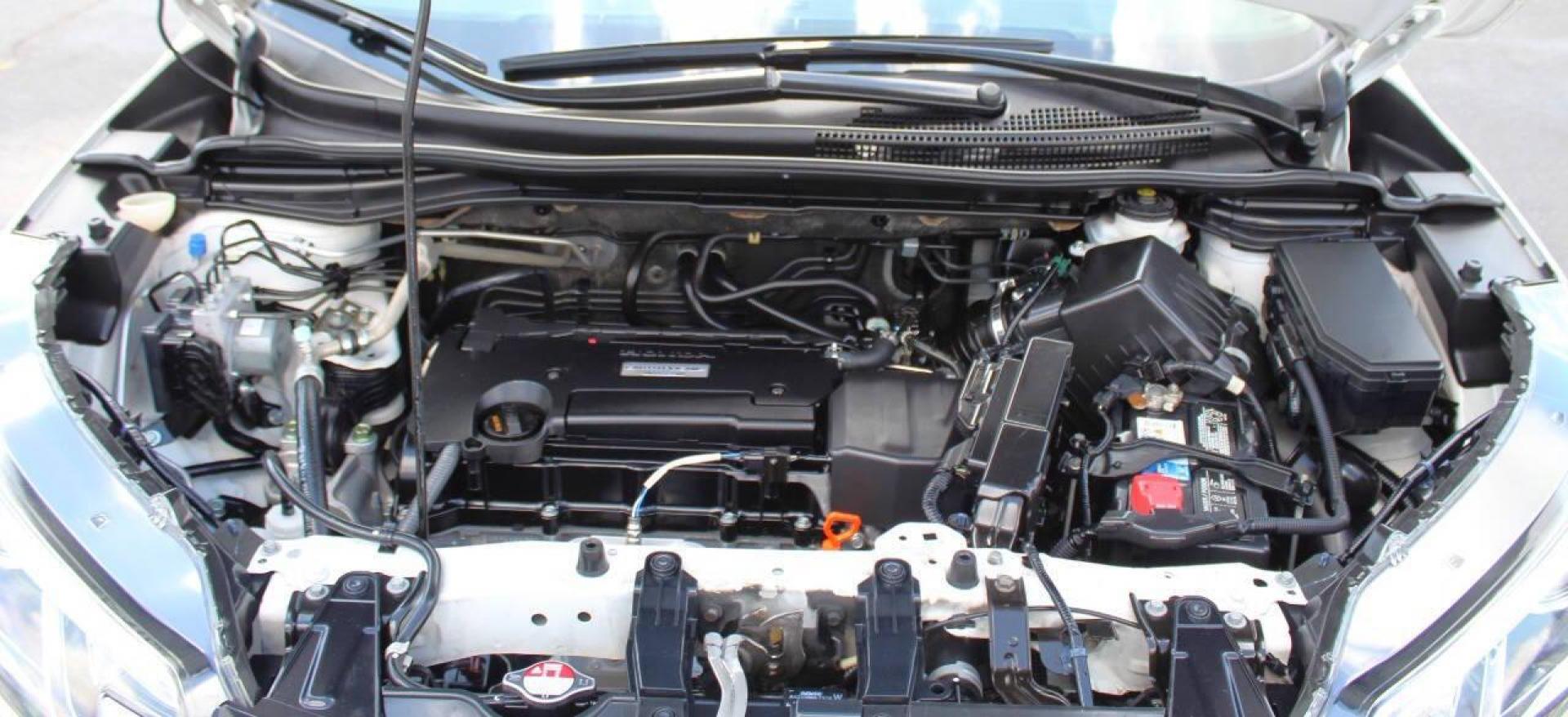 2016 White Honda CR-V Touring 2WD (5J6RM3H93GL) with an 2.4L L4 DOHC 16V engine, CVT transmission, located at 4301 NW 39th , Oklahoma City, OK, 73112, (405) 949-5600, 35.512135, -97.598671 - NO DRIVERS LICENCE -NO FULL COVERAGE INSURANCE - NO CREDIT CHECK. COME ON OVER TO SUPERSPORTS, TAKE A LOOK AND TEST DRIVE. PLEASE GIVE US A CALL AT (405) 949-5600. NO LICENCIA DE CONDUCIR - NO SEGURO DE COBERTURA TOTAL - NO VERIFICACION DE CREDITO. VISITENOS EN SUPERSPORTS, MIRE - Photo#8