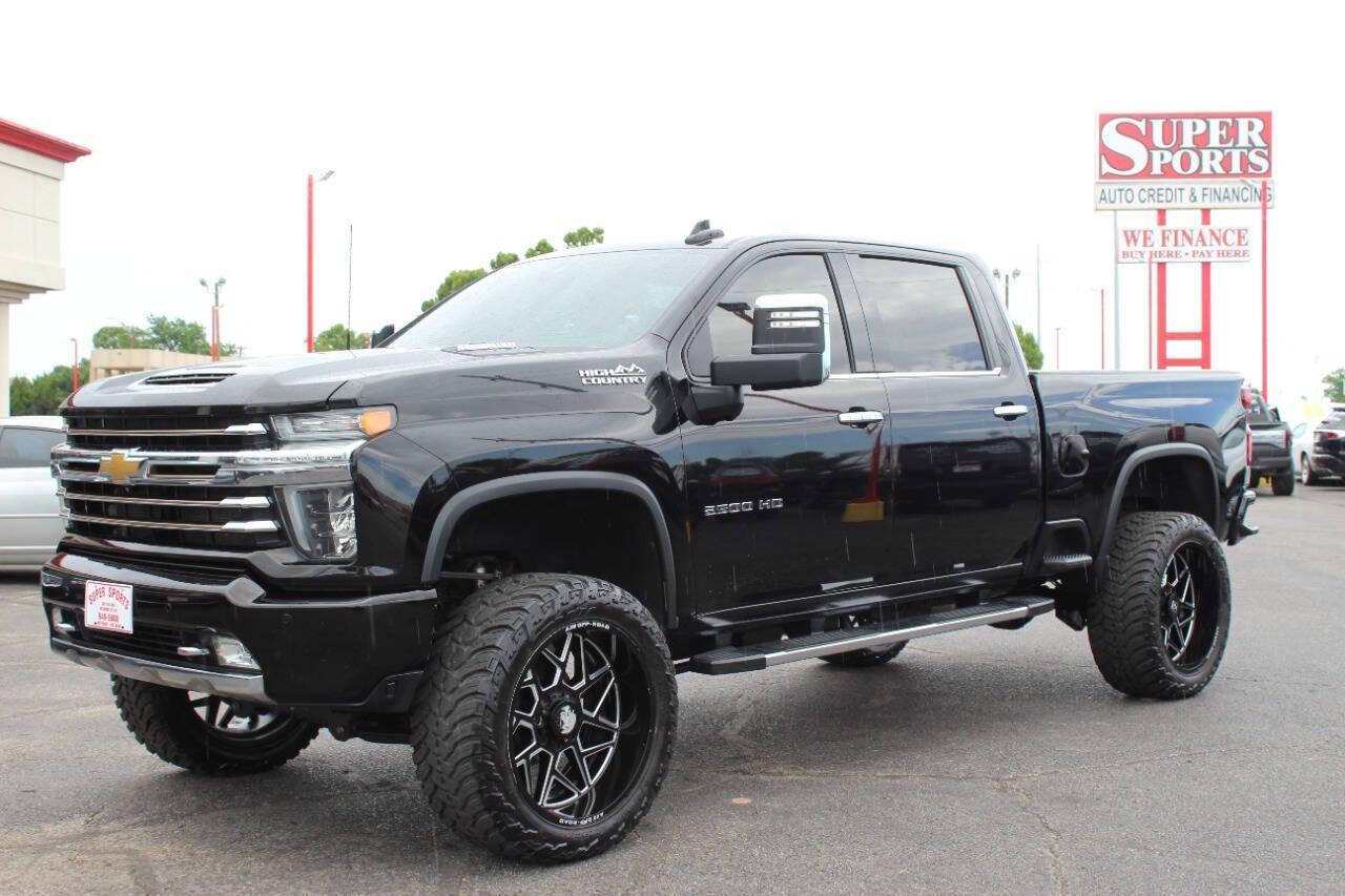 2020 Black Chevrolet Silverado 2500HD High Country Crew Cab Long Box 4WD (1GC4YREY4LF) with an 6.6L V8 OHV 16V DIESEL engine, 6A transmission, located at 4301 NW 39th , Oklahoma City, OK, 73112, (405) 949-5600, 35.512135, -97.598671 - NO DRIVERS LICENCE -NO FULL COVERAGE INSURANCE - NO CREDIT CHECK. COME ON OVER TO SUPERSPORTS, TAKE A LOOK AND TEST DRIVE. PLEASE GIVE US A CALL AT (405) 949-5600. NO LICENCIA DE CONDUCIR - NO SEGURO DE COBERTURA TOTAL - NO VERIFICACION DE CREDITO. VISITENOS EN SUPERSPORTS, MIRE - Photo#6