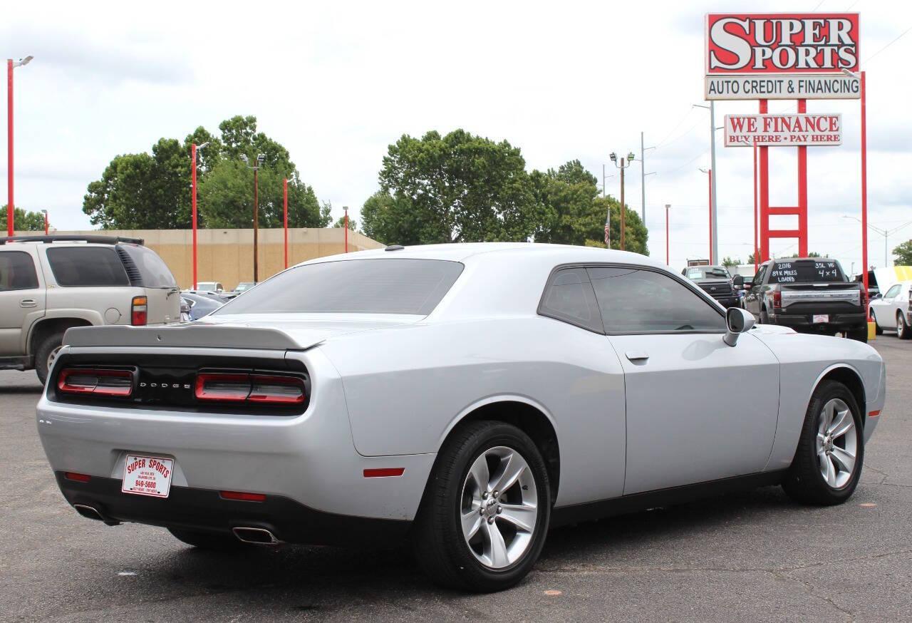 2021 Silver Dodge Challenger SXT (2C3CDZAG1MH) with an 3.6L V6 DOHC 24V engine, 8A transmission, located at 4301 NW 39th , Oklahoma City, OK, 73112, (405) 949-5600, 35.512135, -97.598671 - NO DRIVERS LICENCE -NO FULL COVERAGE INSURANCE - NO CREDIT CHECK. COME ON OVER TO SUPERSPORTS, TAKE A LOOK AND TEST DRIVE. PLEASE GIVE US A CALL AT (405) 949-5600. NO LICENCIA DE CONDUCIR - NO SEGURO DE COBERTURA TOTAL - NO VERIFICACION DE CREDITO. VISITENOS EN SUPERSPORTS, MIRE NUESTR - Photo#3