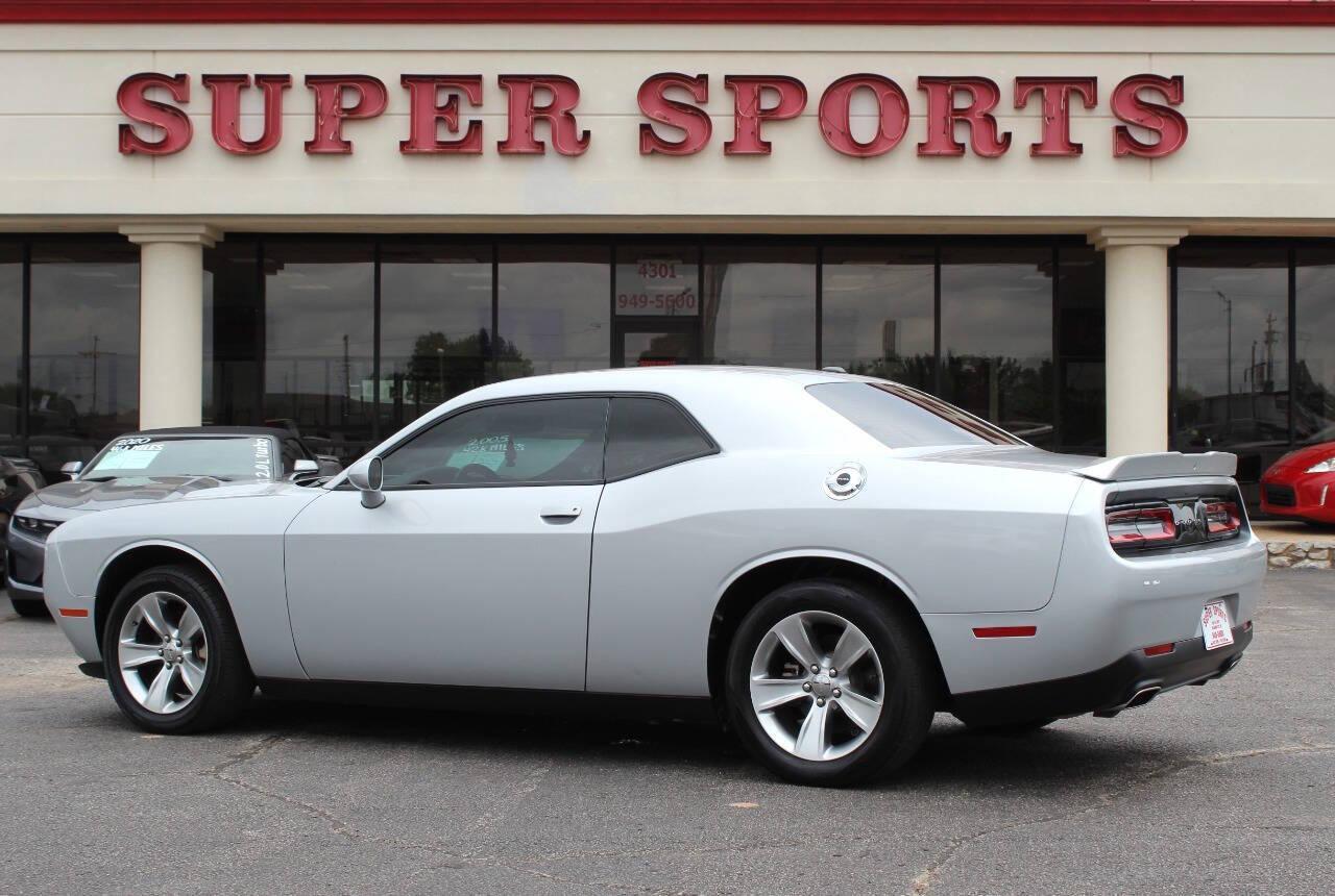 2021 Silver Dodge Challenger SXT (2C3CDZAG1MH) with an 3.6L V6 DOHC 24V engine, 8A transmission, located at 4301 NW 39th , Oklahoma City, OK, 73112, (405) 949-5600, 35.512135, -97.598671 - NO DRIVERS LICENCE -NO FULL COVERAGE INSURANCE - NO CREDIT CHECK. COME ON OVER TO SUPERSPORTS, TAKE A LOOK AND TEST DRIVE. PLEASE GIVE US A CALL AT (405) 949-5600. NO LICENCIA DE CONDUCIR - NO SEGURO DE COBERTURA TOTAL - NO VERIFICACION DE CREDITO. VISITENOS EN SUPERSPORTS, MIRE NUESTR - Photo#4