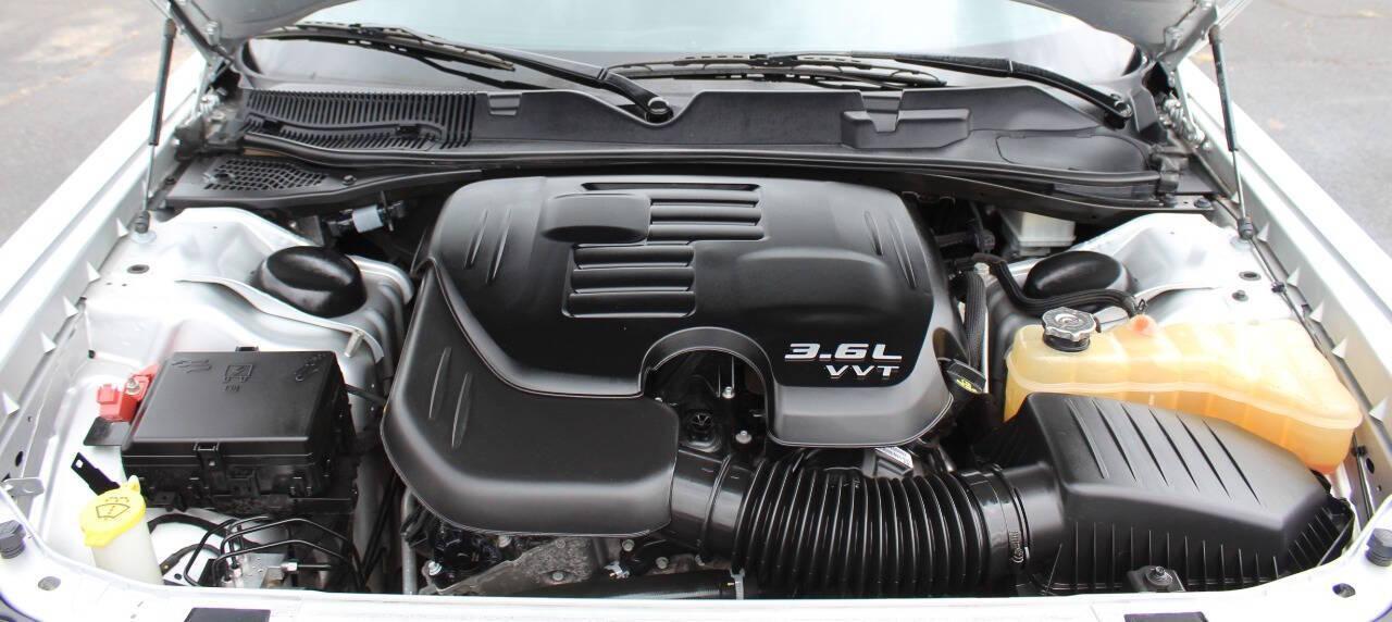 2021 Silver Dodge Challenger SXT (2C3CDZAG1MH) with an 3.6L V6 DOHC 24V engine, 8A transmission, located at 4301 NW 39th , Oklahoma City, OK, 73112, (405) 949-5600, 35.512135, -97.598671 - NO DRIVERS LICENCE -NO FULL COVERAGE INSURANCE - NO CREDIT CHECK. COME ON OVER TO SUPERSPORTS, TAKE A LOOK AND TEST DRIVE. PLEASE GIVE US A CALL AT (405) 949-5600. NO LICENCIA DE CONDUCIR - NO SEGURO DE COBERTURA TOTAL - NO VERIFICACION DE CREDITO. VISITENOS EN SUPERSPORTS, MIRE NUESTR - Photo#7