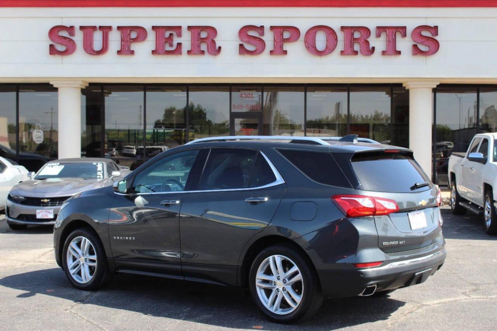 2020 Gray Chevrolet Equinox Premier 2.0 2WD (2GNAXPEX0L6) with an 2.0L L4 DOHC 16V engine, 9A transmission, located at 4301 NW 39th , Oklahoma City, OK, 73112, (405) 949-5600, 35.512135, -97.598671 - NO DRIVERS LICENCE -NO FULL COVERAGE INSURANCE - NO CREDIT CHECK. COME ON OVER TO SUPERSPORTS, TAKE A LOOK AND TEST DRIVE. PLEASE GIVE US A CALL AT (405) 949-5600. NO LICENCIA DE CONDUCIR - NO SEGURO DE COBERTURA TOTAL - NO VERIFICACION DE CREDITO. VISITENOS EN SUPERSPORTS, MIRE - Photo#5