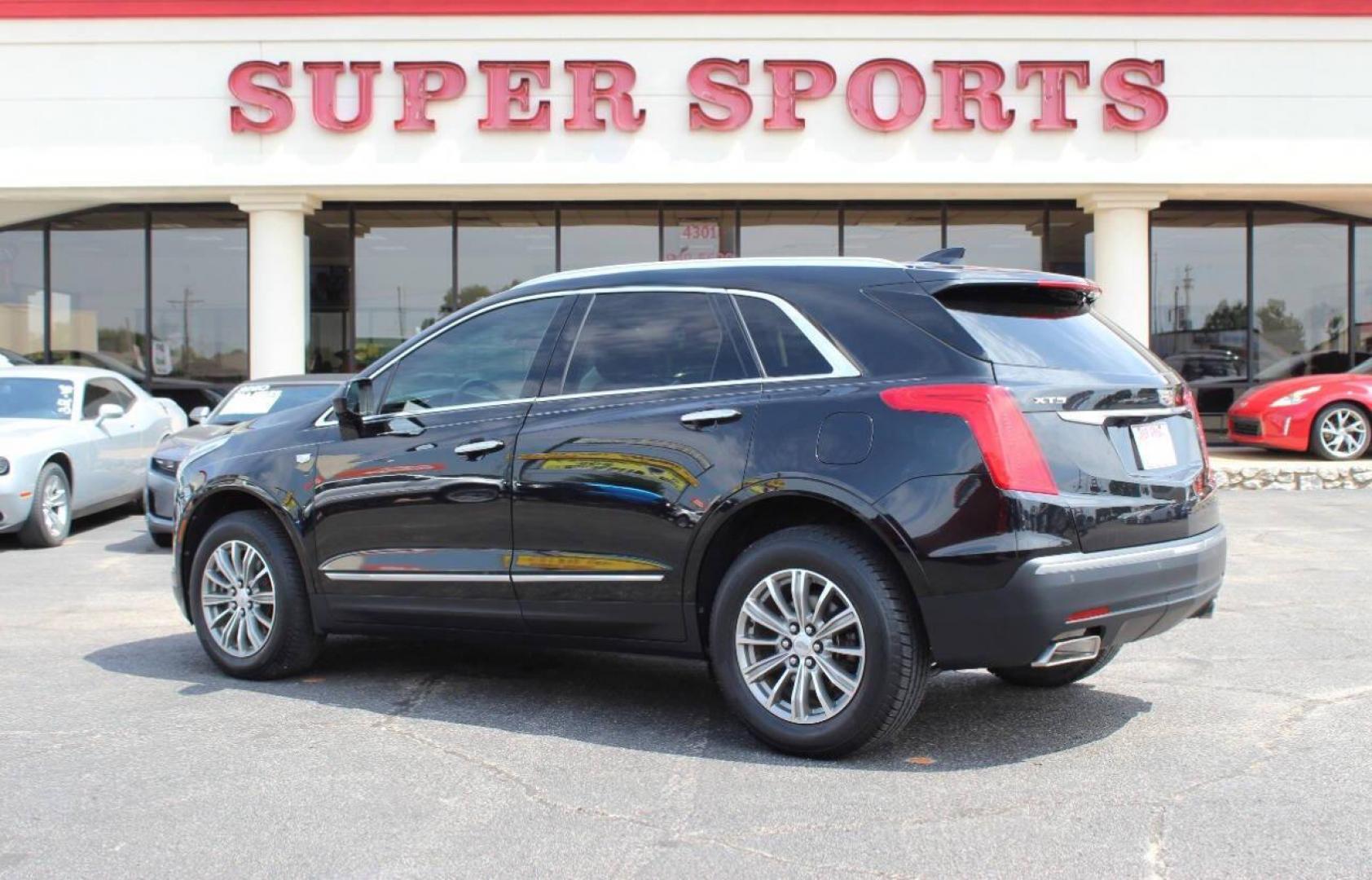 2017 Black Cadillac XT5 Luxury (1GYKNBRS3HZ) with an 3.6L V6 DOHC 24V engine, 8A transmission, located at 4301 NW 39th , Oklahoma City, OK, 73112, (405) 949-5600, 35.512135, -97.598671 - NO DRIVERS LICENCE NO-FULL COVERAGE INSURANCE-NO CREDIT CHECK. COME ON OVER TO SUPERSPORTS AND TAKE A LOOK AND TEST DRIVE. PLEASE GIVE US A CALL AT (405) 949-5600. NO LICENSIA DE MANEJAR- NO SEGURO DE COBERTURA TOTAL- NO VERIFICACCION DE CREDITO. POR FAVOR VENGAN A SUPERSPORTS, ECHE UN - Photo#5