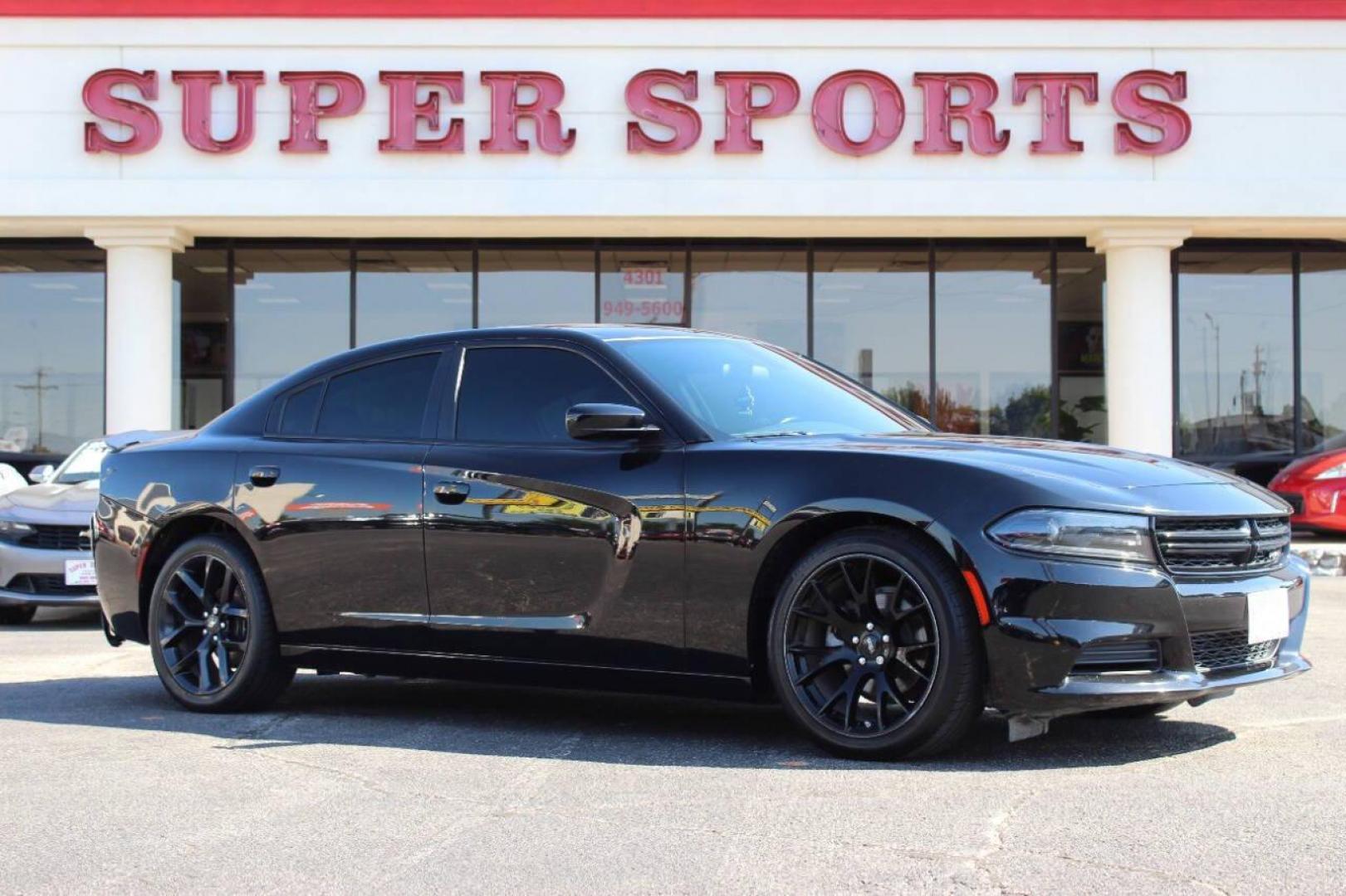 2022 Black Dodge Charger SXT (2C3CDXBGXNH) with an 3.6L V6 DOHC 24V engine, 8A transmission, located at 4301 NW 39th , Oklahoma City, OK, 73112, (405) 949-5600, 35.512135, -97.598671 - NO DRIVERS LICENCE NO-FULL COVERAGE INSURANCE-NO CREDIT CHECK. COME ON OVER TO SUPERSPORTS AND TAKE A LOOK AND TEST DRIVE. PLEASE GIVE US A CALL AT (405) 949-5600. NO LICENSIA DE MANEJAR- NO SEGURO DE COBERTURA TOTAL- NO VERIFICACCION DE CREDITO. POR FAVOR VENGAN A SUPERSPORTS, ECHE UN - Photo#2