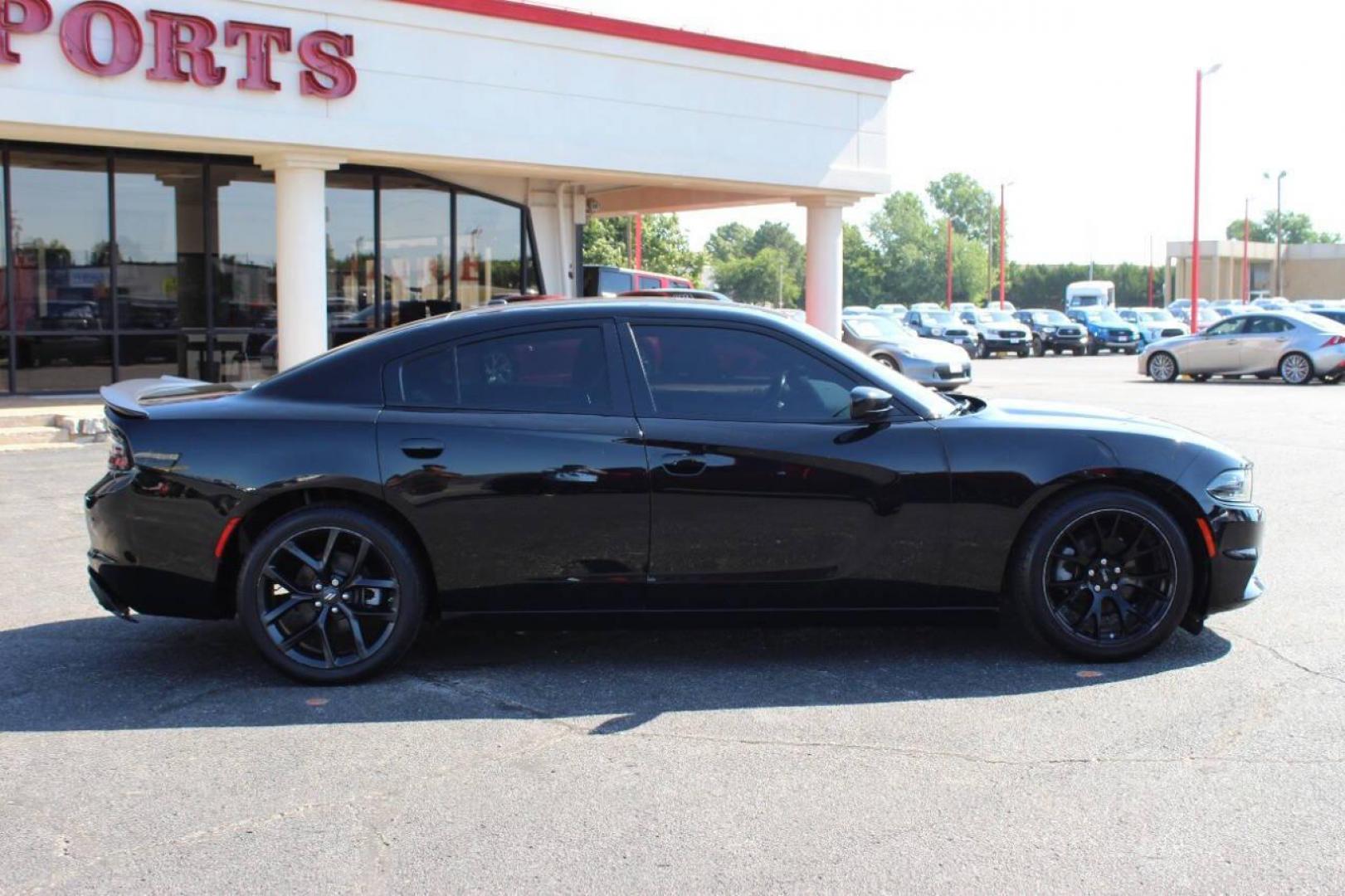 2022 Black Dodge Charger SXT (2C3CDXBGXNH) with an 3.6L V6 DOHC 24V engine, 8A transmission, located at 4301 NW 39th , Oklahoma City, OK, 73112, (405) 949-5600, 35.512135, -97.598671 - NO DRIVERS LICENCE NO-FULL COVERAGE INSURANCE-NO CREDIT CHECK. COME ON OVER TO SUPERSPORTS AND TAKE A LOOK AND TEST DRIVE. PLEASE GIVE US A CALL AT (405) 949-5600. NO LICENSIA DE MANEJAR- NO SEGURO DE COBERTURA TOTAL- NO VERIFICACCION DE CREDITO. POR FAVOR VENGAN A SUPERSPORTS, ECHE UN - Photo#3