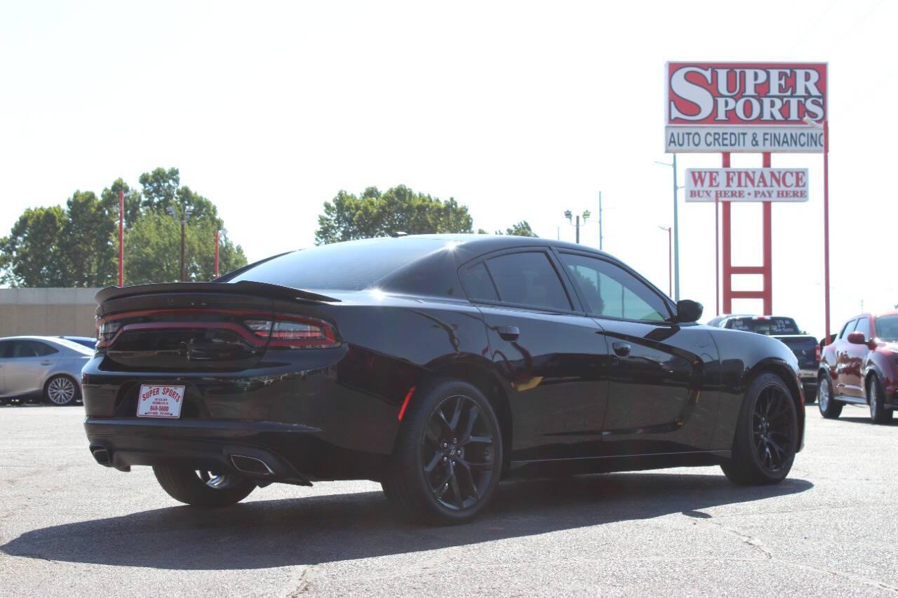 2022 Black Dodge Charger SXT (2C3CDXBGXNH) with an 3.6L V6 DOHC 24V engine, 8A transmission, located at 4301 NW 39th , Oklahoma City, OK, 73112, (405) 949-5600, 35.512135, -97.598671 - NO DRIVERS LICENCE NO-FULL COVERAGE INSURANCE-NO CREDIT CHECK. COME ON OVER TO SUPERSPORTS AND TAKE A LOOK AND TEST DRIVE. PLEASE GIVE US A CALL AT (405) 949-5600. NO LICENSIA DE MANEJAR- NO SEGURO DE COBERTURA TOTAL- NO VERIFICACCION DE CREDITO. POR FAVOR VENGAN A SUPERSPORTS, ECHE UN - Photo#3