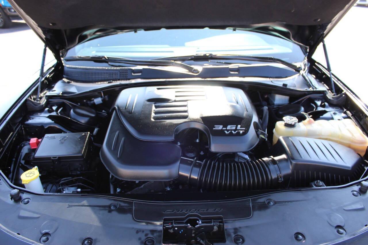 2022 Black Dodge Charger SXT (2C3CDXBGXNH) with an 3.6L V6 DOHC 24V engine, 8A transmission, located at 4301 NW 39th , Oklahoma City, OK, 73112, (405) 949-5600, 35.512135, -97.598671 - NO DRIVERS LICENCE NO-FULL COVERAGE INSURANCE-NO CREDIT CHECK. COME ON OVER TO SUPERSPORTS AND TAKE A LOOK AND TEST DRIVE. PLEASE GIVE US A CALL AT (405) 949-5600. NO LICENSIA DE MANEJAR- NO SEGURO DE COBERTURA TOTAL- NO VERIFICACCION DE CREDITO. POR FAVOR VENGAN A SUPERSPORTS, ECHE UN - Photo#7