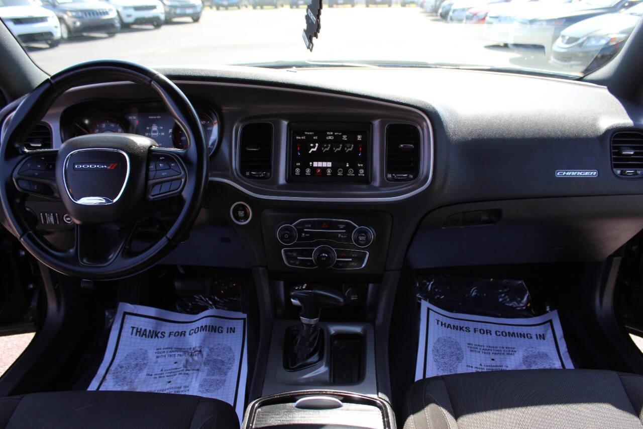 2022 Black Dodge Charger SXT (2C3CDXBGXNH) with an 3.6L V6 DOHC 24V engine, 8A transmission, located at 4301 NW 39th , Oklahoma City, OK, 73112, (405) 949-5600, 35.512135, -97.598671 - NO DRIVERS LICENCE NO-FULL COVERAGE INSURANCE-NO CREDIT CHECK. COME ON OVER TO SUPERSPORTS AND TAKE A LOOK AND TEST DRIVE. PLEASE GIVE US A CALL AT (405) 949-5600. NO LICENSIA DE MANEJAR- NO SEGURO DE COBERTURA TOTAL- NO VERIFICACCION DE CREDITO. POR FAVOR VENGAN A SUPERSPORTS, ECHE UN - Photo#17