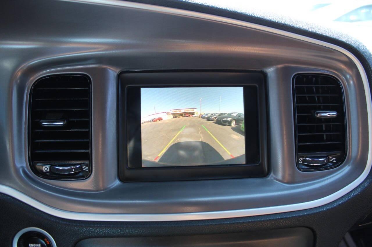 2022 Black Dodge Charger SXT (2C3CDXBGXNH) with an 3.6L V6 DOHC 24V engine, 8A transmission, located at 4301 NW 39th , Oklahoma City, OK, 73112, (405) 949-5600, 35.512135, -97.598671 - NO DRIVERS LICENCE NO-FULL COVERAGE INSURANCE-NO CREDIT CHECK. COME ON OVER TO SUPERSPORTS AND TAKE A LOOK AND TEST DRIVE. PLEASE GIVE US A CALL AT (405) 949-5600. NO LICENSIA DE MANEJAR- NO SEGURO DE COBERTURA TOTAL- NO VERIFICACCION DE CREDITO. POR FAVOR VENGAN A SUPERSPORTS, ECHE UN - Photo#18