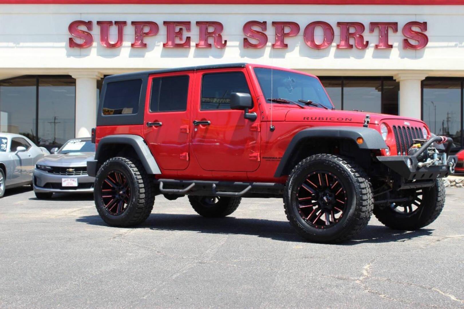 2017 Red Jeep Wrangler Unlimited Rubicon 4WD (1C4BJWFGXHL) with an 3.6L V6 DOHC 24V FFV engine, Automatic 5-Speed transmission, located at 4301 NW 39th , Oklahoma City, OK, 73112, (405) 949-5600, 35.512135, -97.598671 - NO DRIVERS LICENCE -NO FULL COVERAGE INSURANCE - NO CREDIT CHECK. COME ON OVER TO SUPERSPORTS, TAKE A LOOK AND TEST DRIVE. PLEASE GIVE US A CALL AT (405) 949-5600. NO LICENCIA DE CONDUCIR - NO SEGURO DE COBERTURA TOTAL - NO VERIFICACION DE CREDITO. VISITENOS EN SUPERSPORTS, MIRE NUESTRO - Photo#2