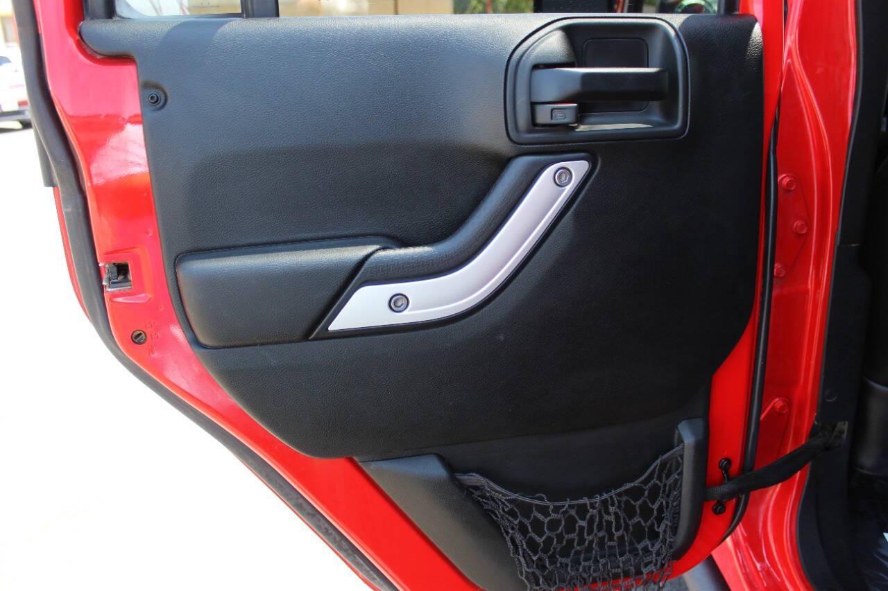 2017 Red Jeep Wrangler Unlimited Rubicon 4WD (1C4BJWFGXHL) with an 3.6L V6 DOHC 24V FFV engine, Automatic 5-Speed transmission, located at 4301 NW 39th , Oklahoma City, OK, 73112, (405) 949-5600, 35.512135, -97.598671 - NO DRIVERS LICENCE -NO FULL COVERAGE INSURANCE - NO CREDIT CHECK. COME ON OVER TO SUPERSPORTS, TAKE A LOOK AND TEST DRIVE. PLEASE GIVE US A CALL AT (405) 949-5600. NO LICENCIA DE CONDUCIR - NO SEGURO DE COBERTURA TOTAL - NO VERIFICACION DE CREDITO. VISITENOS EN SUPERSPORTS, MIRE NUESTRO - Photo#14