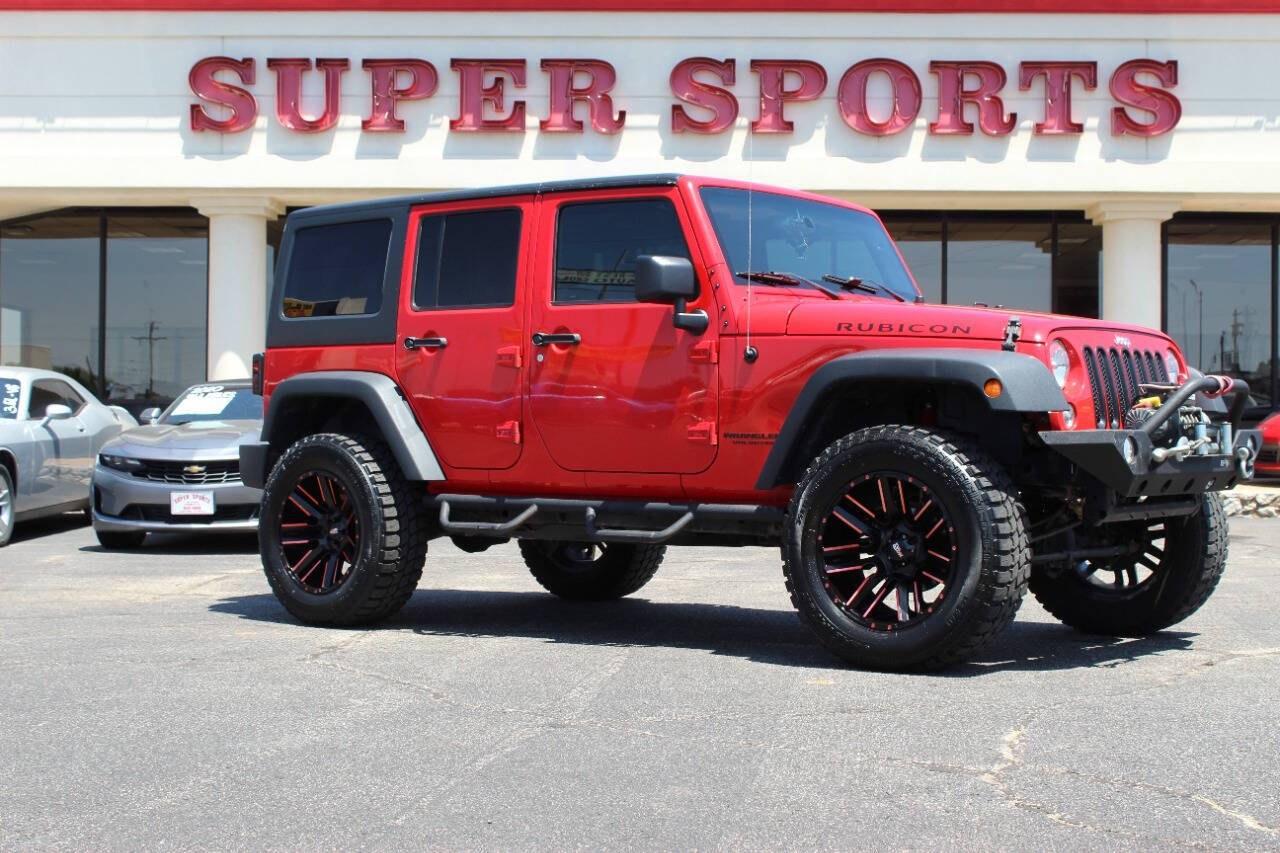 2017 Red Jeep Wrangler Unlimited Unlimited Rubicon 4WD (1C4BJWFGXHL) with an 3.6L V6 3.6L V6 engine, Automatic 5-Speed transmission, located at 4301 NW 39th , Oklahoma City, OK, 73112, (405) 949-5600, 35.512135, -97.598671 - Hablamos espanol. SPEND SMART --- BUY FROM SUPER SPORTS. ALL PRICES, DOWN PAYMENTS, PAYMENTS, AND FINANCE TERMS ARE NEGOTIABLE AT THE TIME OF APPROVAL. WE WILL WORK WITH YOU TO FIT YOUR BUDGET. WE WILL EVEN LOWER AND ADJUST THE NUMBERS TO HELP MAKE THE VEHICLE MORE AFFORDABLE FOR YOU.- Photo#0