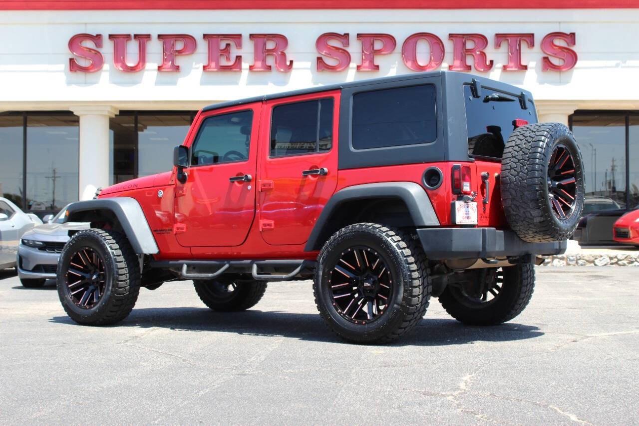 2017 Red Jeep Wrangler Unlimited Unlimited Rubicon 4WD (1C4BJWFGXHL) with an 3.6L V6 3.6L V6 engine, Automatic 5-Speed transmission, located at 4301 NW 39th , Oklahoma City, OK, 73112, (405) 949-5600, 35.512135, -97.598671 - Hablamos espanol. SPEND SMART --- BUY FROM SUPER SPORTS. ALL PRICES, DOWN PAYMENTS, PAYMENTS, AND FINANCE TERMS ARE NEGOTIABLE AT THE TIME OF APPROVAL. WE WILL WORK WITH YOU TO FIT YOUR BUDGET. WE WILL EVEN LOWER AND ADJUST THE NUMBERS TO HELP MAKE THE VEHICLE MORE AFFORDABLE FOR YOU.- Photo#4