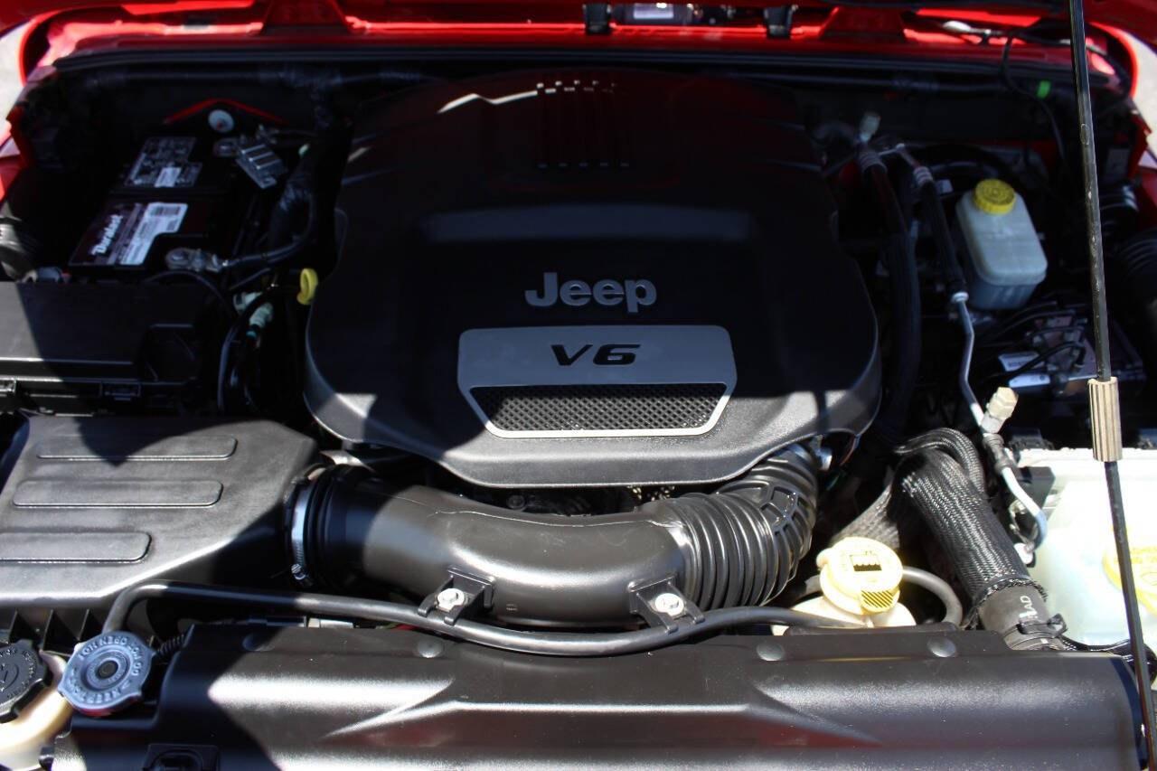 2017 Red Jeep Wrangler Unlimited Unlimited Rubicon 4WD (1C4BJWFGXHL) with an 3.6L V6 3.6L V6 engine, Automatic 5-Speed transmission, located at 4301 NW 39th , Oklahoma City, OK, 73112, (405) 949-5600, 35.512135, -97.598671 - Hablamos espanol. SPEND SMART --- BUY FROM SUPER SPORTS. ALL PRICES, DOWN PAYMENTS, PAYMENTS, AND FINANCE TERMS ARE NEGOTIABLE AT THE TIME OF APPROVAL. WE WILL WORK WITH YOU TO FIT YOUR BUDGET. WE WILL EVEN LOWER AND ADJUST THE NUMBERS TO HELP MAKE THE VEHICLE MORE AFFORDABLE FOR YOU.- Photo#7