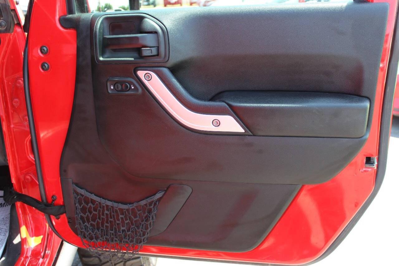 2017 Red Jeep Wrangler Unlimited Unlimited Rubicon 4WD (1C4BJWFGXHL) with an 3.6L V6 3.6L V6 engine, Automatic 5-Speed transmission, located at 4301 NW 39th , Oklahoma City, OK, 73112, (405) 949-5600, 35.512135, -97.598671 - Hablamos espanol. SPEND SMART --- BUY FROM SUPER SPORTS. ALL PRICES, DOWN PAYMENTS, PAYMENTS, AND FINANCE TERMS ARE NEGOTIABLE AT THE TIME OF APPROVAL. WE WILL WORK WITH YOU TO FIT YOUR BUDGET. WE WILL EVEN LOWER AND ADJUST THE NUMBERS TO HELP MAKE THE VEHICLE MORE AFFORDABLE FOR YOU.- Photo#9