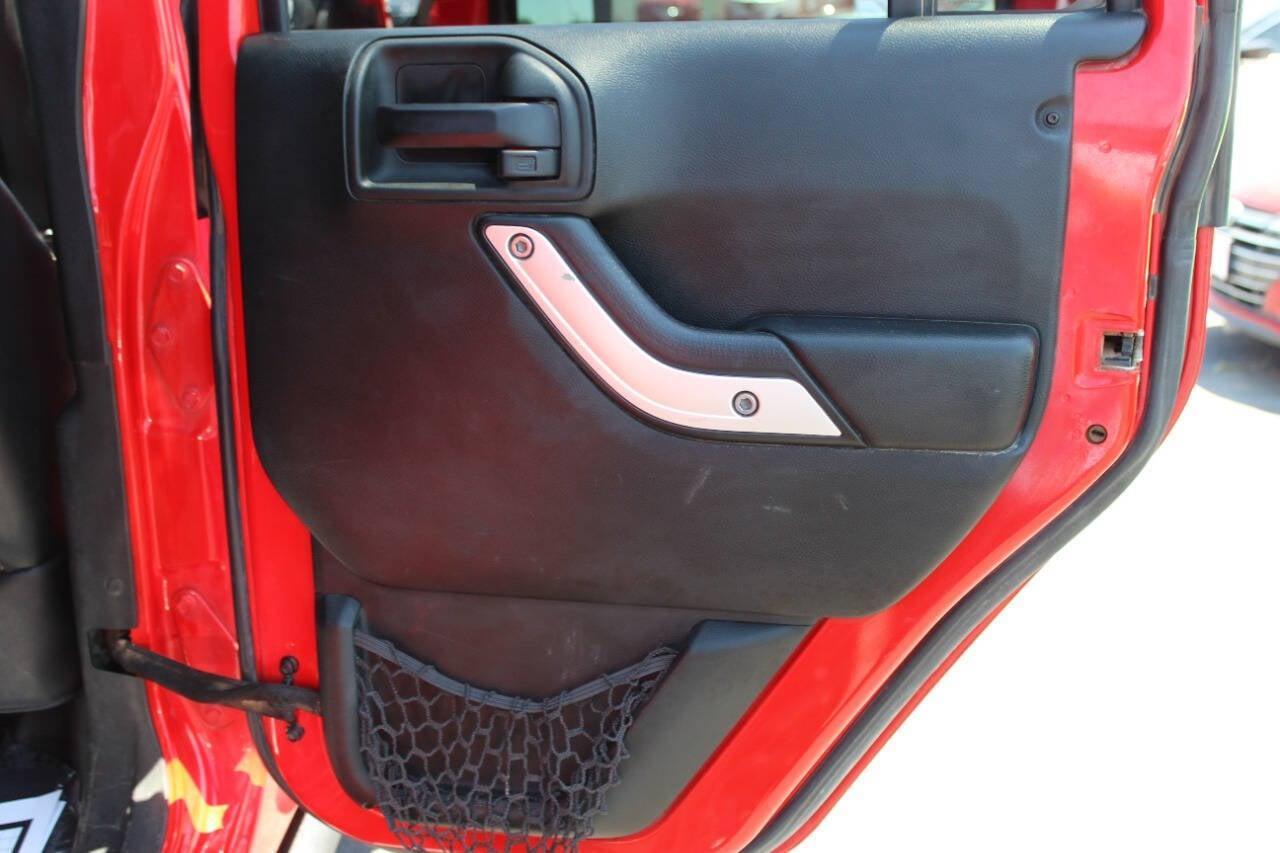 2017 Red Jeep Wrangler Unlimited Unlimited Rubicon 4WD (1C4BJWFGXHL) with an 3.6L V6 3.6L V6 engine, Automatic 5-Speed transmission, located at 4301 NW 39th , Oklahoma City, OK, 73112, (405) 949-5600, 35.512135, -97.598671 - NO DRIVERS LICENCE -NO FULL COVERAGE INSURANCE - NO CREDIT CHECK. COME ON OVER TO SUPERSPORTS, TAKE A LOOK AND TEST DRIVE. PLEASE GIVE US A CALL AT (405) 949-5600. NO LICENCIA DE CONDUCIR - NO SEGURO DE COBERTURA TOTAL - NO VERIFICACION DE CREDITO. VISITENOS EN SUPERSPORTS, MIRE NUESTRO - Photo#11