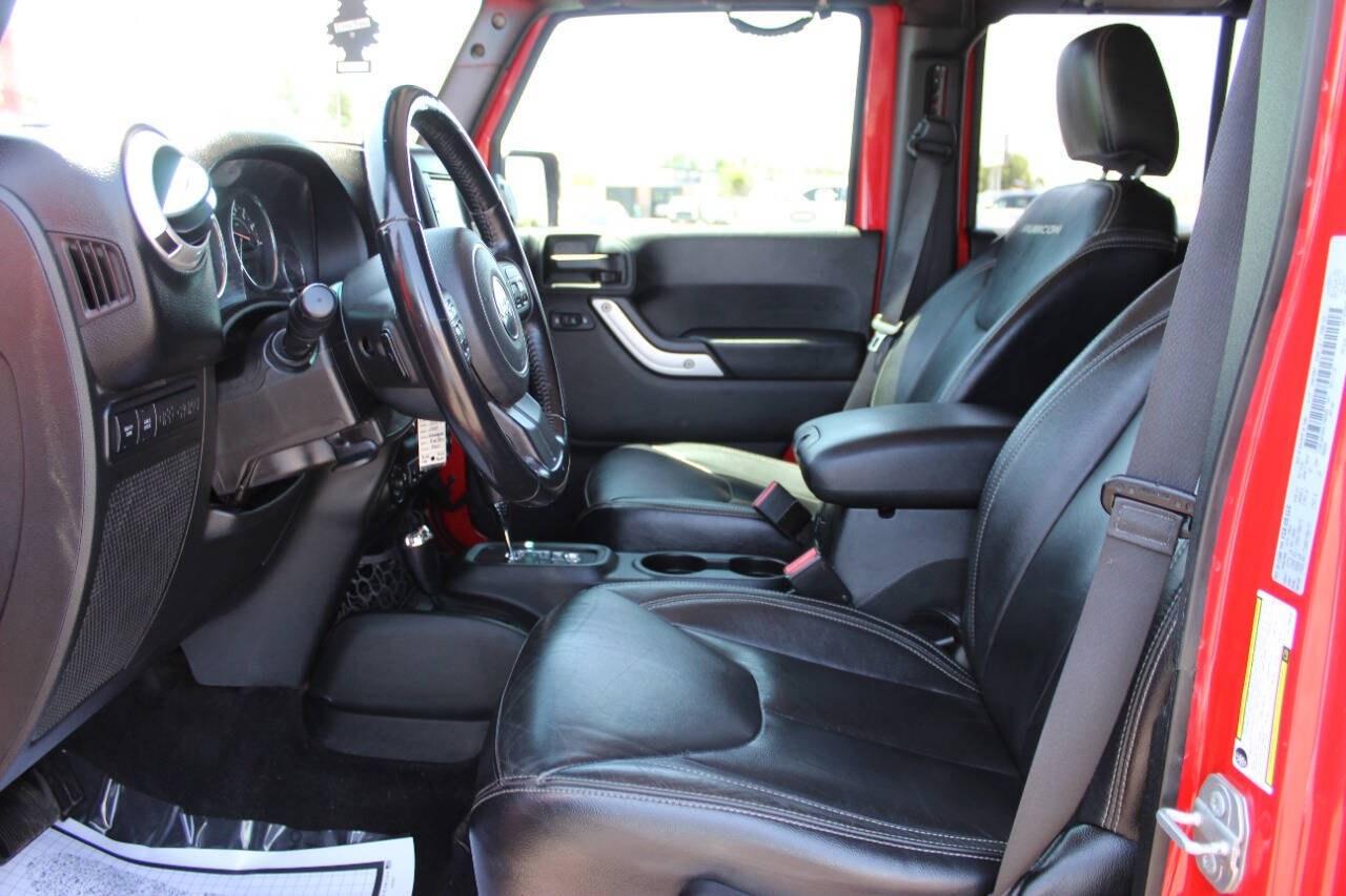 2017 Red Jeep Wrangler Unlimited Unlimited Rubicon 4WD (1C4BJWFGXHL) with an 3.6L V6 3.6L V6 engine, Automatic 5-Speed transmission, located at 4301 NW 39th , Oklahoma City, OK, 73112, (405) 949-5600, 35.512135, -97.598671 - Hablamos espanol. SPEND SMART --- BUY FROM SUPER SPORTS. ALL PRICES, DOWN PAYMENTS, PAYMENTS, AND FINANCE TERMS ARE NEGOTIABLE AT THE TIME OF APPROVAL. WE WILL WORK WITH YOU TO FIT YOUR BUDGET. WE WILL EVEN LOWER AND ADJUST THE NUMBERS TO HELP MAKE THE VEHICLE MORE AFFORDABLE FOR YOU.- Photo#15