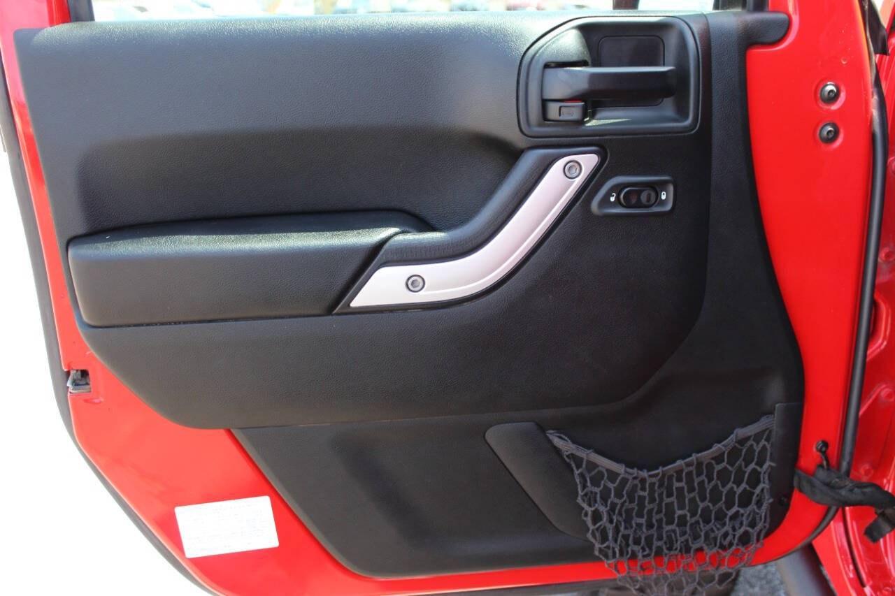 2017 Red Jeep Wrangler Unlimited Unlimited Rubicon 4WD (1C4BJWFGXHL) with an 3.6L V6 3.6L V6 engine, Automatic 5-Speed transmission, located at 4301 NW 39th , Oklahoma City, OK, 73112, (405) 949-5600, 35.512135, -97.598671 - Hablamos espanol. SPEND SMART --- BUY FROM SUPER SPORTS. ALL PRICES, DOWN PAYMENTS, PAYMENTS, AND FINANCE TERMS ARE NEGOTIABLE AT THE TIME OF APPROVAL. WE WILL WORK WITH YOU TO FIT YOUR BUDGET. WE WILL EVEN LOWER AND ADJUST THE NUMBERS TO HELP MAKE THE VEHICLE MORE AFFORDABLE FOR YOU.- Photo#16