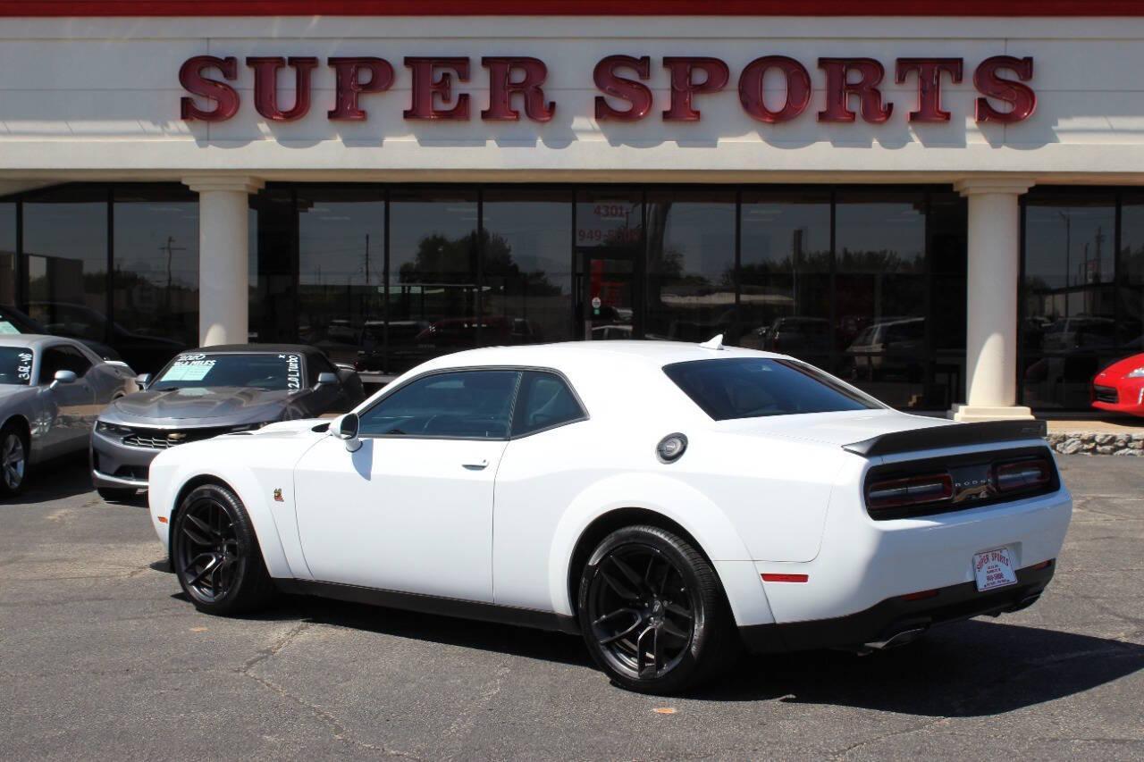 2023 White Dodge Challenger R/T Scat Pack (2C3CDZFJ0PH) with an 6.2L V8 OHV 16V engine, 6A transmission, located at 4301 NW 39th , Oklahoma City, OK, 73112, (405) 949-5600, 35.512135, -97.598671 - NO DRIVERS LICENCE -NO FULL COVERAGE INSURANCE - NO CREDIT CHECK. COME ON OVER TO SUPERSPORTS, TAKE A LOOK AND TEST DRIVE. PLEASE GIVE US A CALL AT (405) 949-5600. NO LICENCIA DE CONDUCIR - NO SEGURO DE COBERTURA TOTAL - NO VERIFICACION DE CREDITO. VISITENOS EN SUPERSPORTS, MIRE NUESTRO - Photo#4