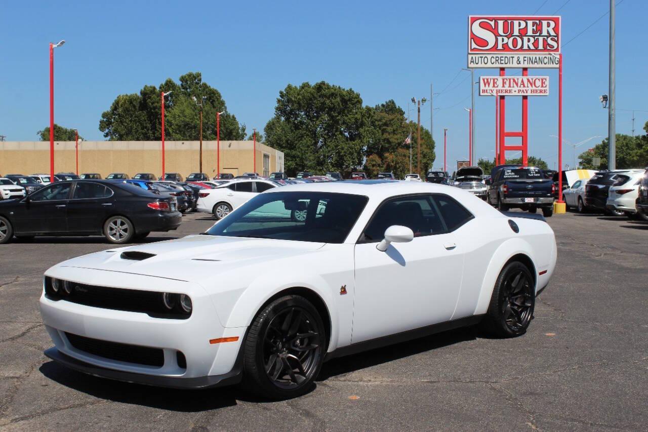 2023 White Dodge Challenger R/T Scat Pack (2C3CDZFJ0PH) with an 6.2L V8 OHV 16V engine, 6A transmission, located at 4301 NW 39th , Oklahoma City, OK, 73112, (405) 949-5600, 35.512135, -97.598671 - NO DRIVERS LICENCE -NO FULL COVERAGE INSURANCE - NO CREDIT CHECK. COME ON OVER TO SUPERSPORTS, TAKE A LOOK AND TEST DRIVE. PLEASE GIVE US A CALL AT (405) 949-5600. NO LICENCIA DE CONDUCIR - NO SEGURO DE COBERTURA TOTAL - NO VERIFICACION DE CREDITO. VISITENOS EN SUPERSPORTS, MIRE NUESTRO - Photo#6