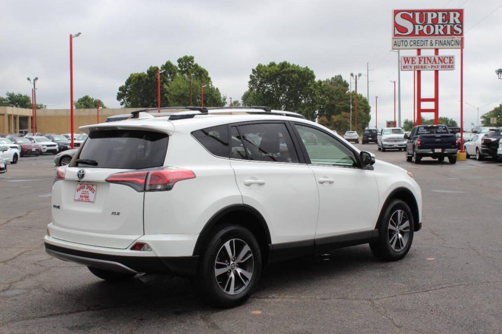 2017 White Toyota RAV4 XLE FWD (JTMWFREV0HJ) with an 2.5L L4 DOHC 16V engine, 6A transmission, located at 4301 NW 39th , Oklahoma City, OK, 73112, (405) 949-5600, 35.512135, -97.598671 - NO DRIVERS LICENCE -NO FULL COVERAGE INSURANCE - NO CREDIT CHECK. COME ON OVER TO SUPERSPORTS, TAKE A LOOK AND TEST DRIVE. PLEASE GIVE US A CALL AT (405) 949-5600. NO LICENCIA DE CONDUCIR - NO SEGURO DE COBERTURA TOTAL - NO VERIFICACION DE CREDITO. VISITENOS EN SUPERSPORTS, MIRE NUESTRO - Photo#4