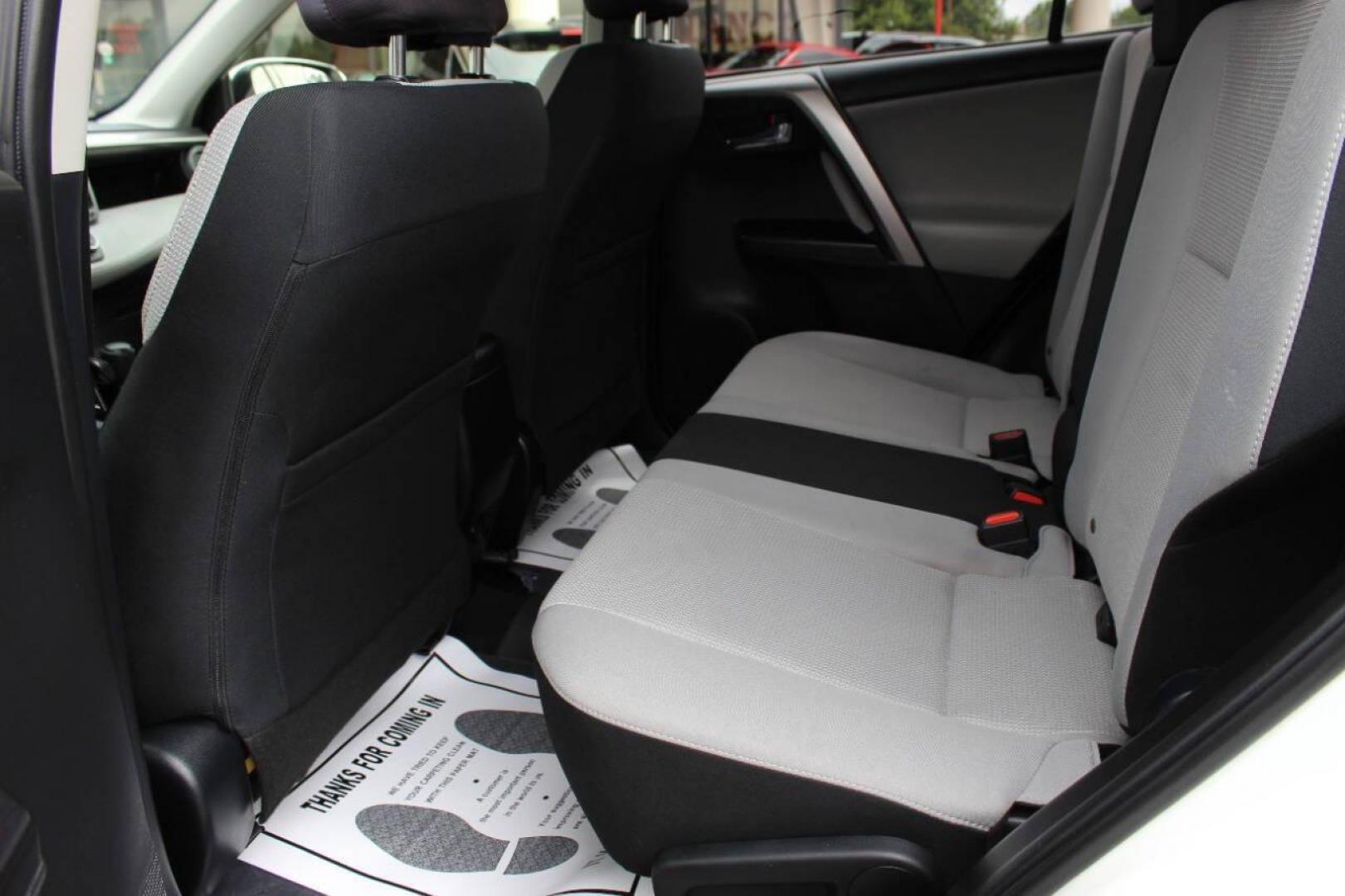 2017 White Toyota RAV4 XLE FWD (JTMWFREV0HJ) with an 2.5L L4 DOHC 16V engine, 6A transmission, located at 4301 NW 39th , Oklahoma City, OK, 73112, (405) 949-5600, 35.512135, -97.598671 - NO DRIVERS LICENCE -NO FULL COVERAGE INSURANCE - NO CREDIT CHECK. COME ON OVER TO SUPERSPORTS, TAKE A LOOK AND TEST DRIVE. PLEASE GIVE US A CALL AT (405) 949-5600. NO LICENCIA DE CONDUCIR - NO SEGURO DE COBERTURA TOTAL - NO VERIFICACION DE CREDITO. VISITENOS EN SUPERSPORTS, MIRE NUESTRO - Photo#14