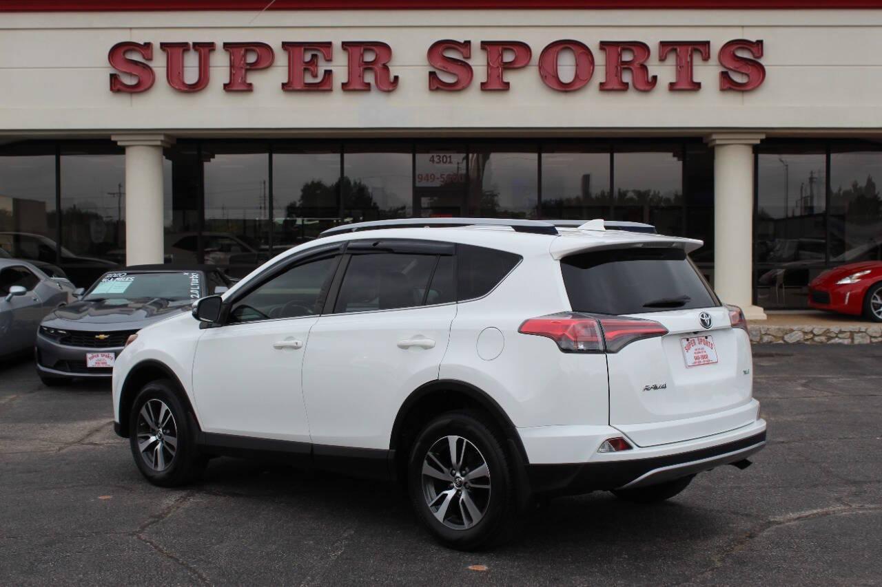 2018 White Toyota RAV4 XLE FWD (JTMWFREV1JJ) with an 2.5L L4 DOHC 16V engine, 6A transmission, located at 4301 NW 39th , Oklahoma City, OK, 73112, (405) 949-5600, 35.512135, -97.598671 - NO DRIVERS LICENCE -NO FULL COVERAGE INSURANCE - NO CREDIT CHECK. COME ON OVER TO SUPERSPORTS, TAKE A LOOK AND TEST DRIVE. PLEASE GIVE US A CALL AT (405) 949-5600. NO LICENCIA DE CONDUCIR - NO SEGURO DE COBERTURA TOTAL - NO VERIFICACION DE CREDITO. VISITENOS EN SUPERSPORTS, MIRE NUESTRO - Photo#4