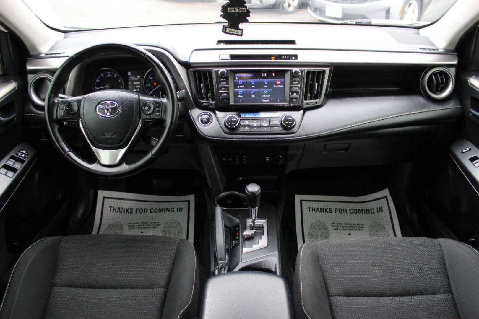 2018 White Toyota RAV4 XLE FWD (JTMWFREV1JJ) with an 2.5L L4 DOHC 16V engine, 6A transmission, located at 4301 NW 39th , Oklahoma City, OK, 73112, (405) 949-5600, 35.512135, -97.598671 - NO DRIVERS LICENCE -NO FULL COVERAGE INSURANCE - NO CREDIT CHECK. COME ON OVER TO SUPERSPORTS, TAKE A LOOK AND TEST DRIVE. PLEASE GIVE US A CALL AT (405) 949-5600. NO LICENCIA DE CONDUCIR - NO SEGURO DE COBERTURA TOTAL - NO VERIFICACION DE CREDITO. VISITENOS EN SUPERSPORTS, MIRE NUESTRO - Photo#18
