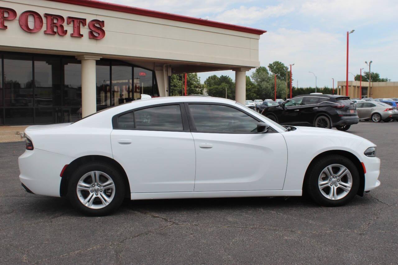 2023 White Dodge Charger SXT (2C3CDXBG5PH) with an 3.6L V6 DOHC 24V engine, 8A transmission, located at 4301 NW 39th , Oklahoma City, OK, 73112, (405) 949-5600, 35.512135, -97.598671 - NO DRIVERS LICENCE -NO FULL COVERAGE INSURANCE - NO CREDIT CHECK. COME ON OVER TO SUPERSPORTS, TAKE A LOOK AND TEST DRIVE. PLEASE GIVE US A CALL AT (405) 949-5600. NO LICENCIA DE CONDUCIR - NO SEGURO DE COBERTURA TOTAL - NO VERIFICACION DE CREDITO. VISITENOS EN SUPERSPORTS, MIRE NUESTRO - Photo#2