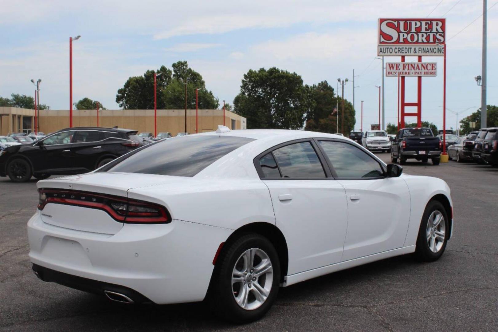 2023 White Dodge Charger SXT (2C3CDXBG5PH) with an 3.6L V6 DOHC 24V engine, 8A transmission, located at 4301 NW 39th , Oklahoma City, OK, 73112, (405) 949-5600, 35.512135, -97.598671 - NO DRIVERS LICENCE -NO FULL COVERAGE INSURANCE - NO CREDIT CHECK. COME ON OVER TO SUPERSPORTS, TAKE A LOOK AND TEST DRIVE. PLEASE GIVE US A CALL AT (405) 949-5600. NO LICENCIA DE CONDUCIR - NO SEGURO DE COBERTURA TOTAL - NO VERIFICACION DE CREDITO. VISITENOS EN SUPERSPORTS, MIRE NUESTRO - Photo#4
