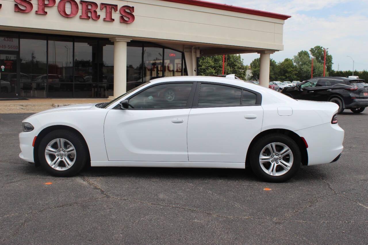 2023 White Dodge Charger SXT (2C3CDXBG5PH) with an 3.6L V6 DOHC 24V engine, 8A transmission, located at 4301 NW 39th , Oklahoma City, OK, 73112, (405) 949-5600, 35.512135, -97.598671 - NO DRIVERS LICENCE -NO FULL COVERAGE INSURANCE - NO CREDIT CHECK. COME ON OVER TO SUPERSPORTS, TAKE A LOOK AND TEST DRIVE. PLEASE GIVE US A CALL AT (405) 949-5600. NO LICENCIA DE CONDUCIR - NO SEGURO DE COBERTURA TOTAL - NO VERIFICACION DE CREDITO. VISITENOS EN SUPERSPORTS, MIRE NUESTRO - Photo#5