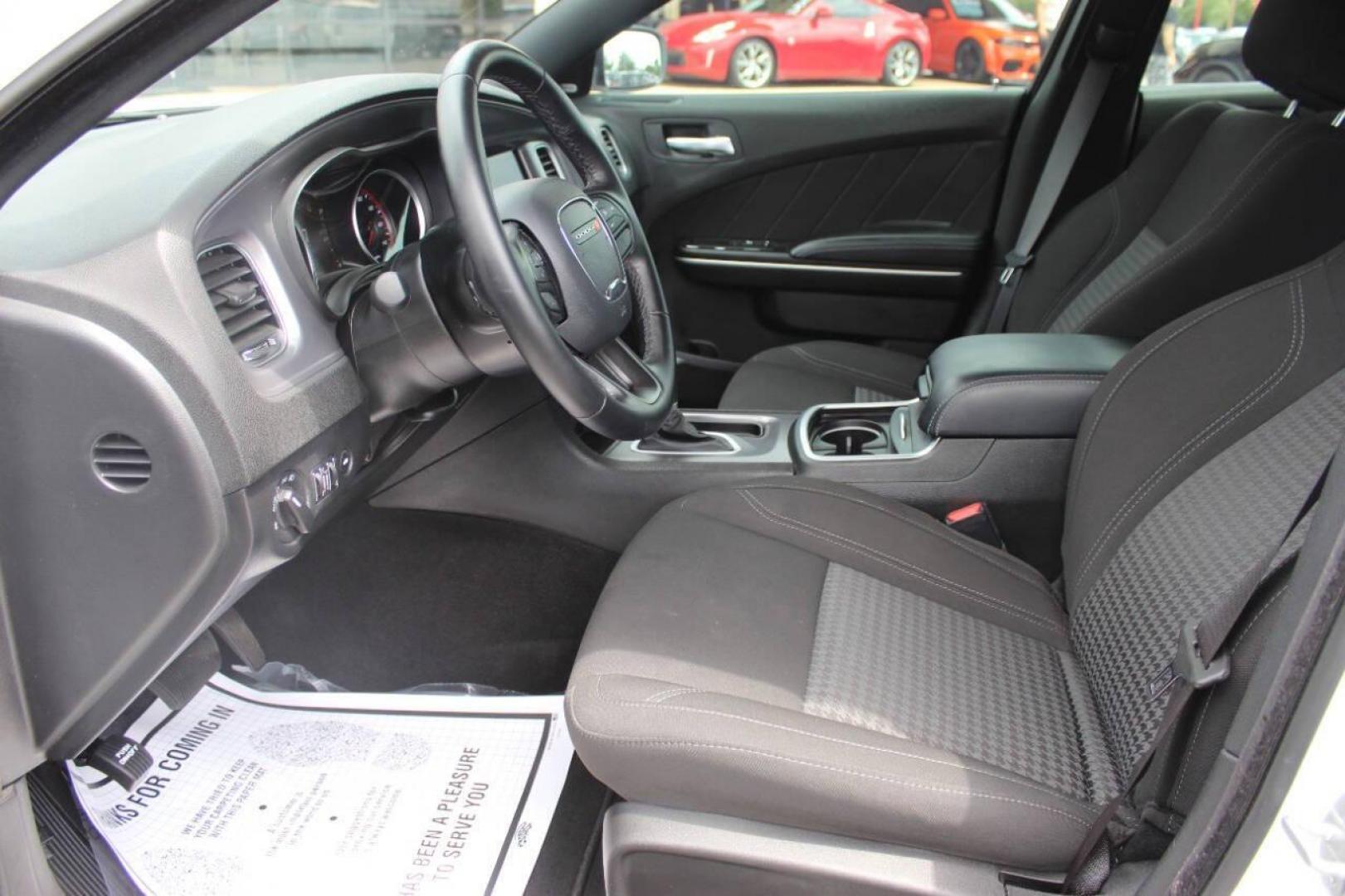 2023 White Dodge Charger SXT (2C3CDXBG5PH) with an 3.6L V6 DOHC 24V engine, 8A transmission, located at 4301 NW 39th , Oklahoma City, OK, 73112, (405) 949-5600, 35.512135, -97.598671 - NO DRIVERS LICENCE -NO FULL COVERAGE INSURANCE - NO CREDIT CHECK. COME ON OVER TO SUPERSPORTS, TAKE A LOOK AND TEST DRIVE. PLEASE GIVE US A CALL AT (405) 949-5600. NO LICENCIA DE CONDUCIR - NO SEGURO DE COBERTURA TOTAL - NO VERIFICACION DE CREDITO. VISITENOS EN SUPERSPORTS, MIRE NUESTRO - Photo#16