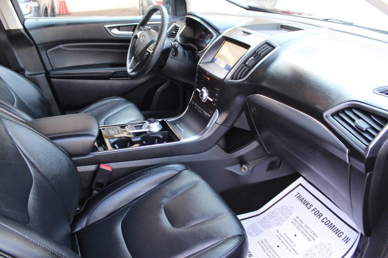2020 Black Ford Edge Titanium (2FMPK3K96LB) with an 2.0L L4 DOHC 16V engine, 6A transmission, located at 4301 NW 39th , Oklahoma City, OK, 73112, (405) 949-5600, 35.512135, -97.598671 - NO DRIVERS LICENSE - NO FULL COVERAGE INSURANCE - NO CREDIT CHECK. COME ON OVER TO SUPERSPORTS AND TAKE A LOOK AND TEST DRIVE PLEASE GIVE US A CALL AT (405) 949-5600. NO LICENCIA DE MANEJAR - NO SEGURO DE COBERTURA TOTAL - NO VERIFICACION DE CREDITO. POR FAVOR VENGAN A SUPERSPORTS, ECHE - Photo#8