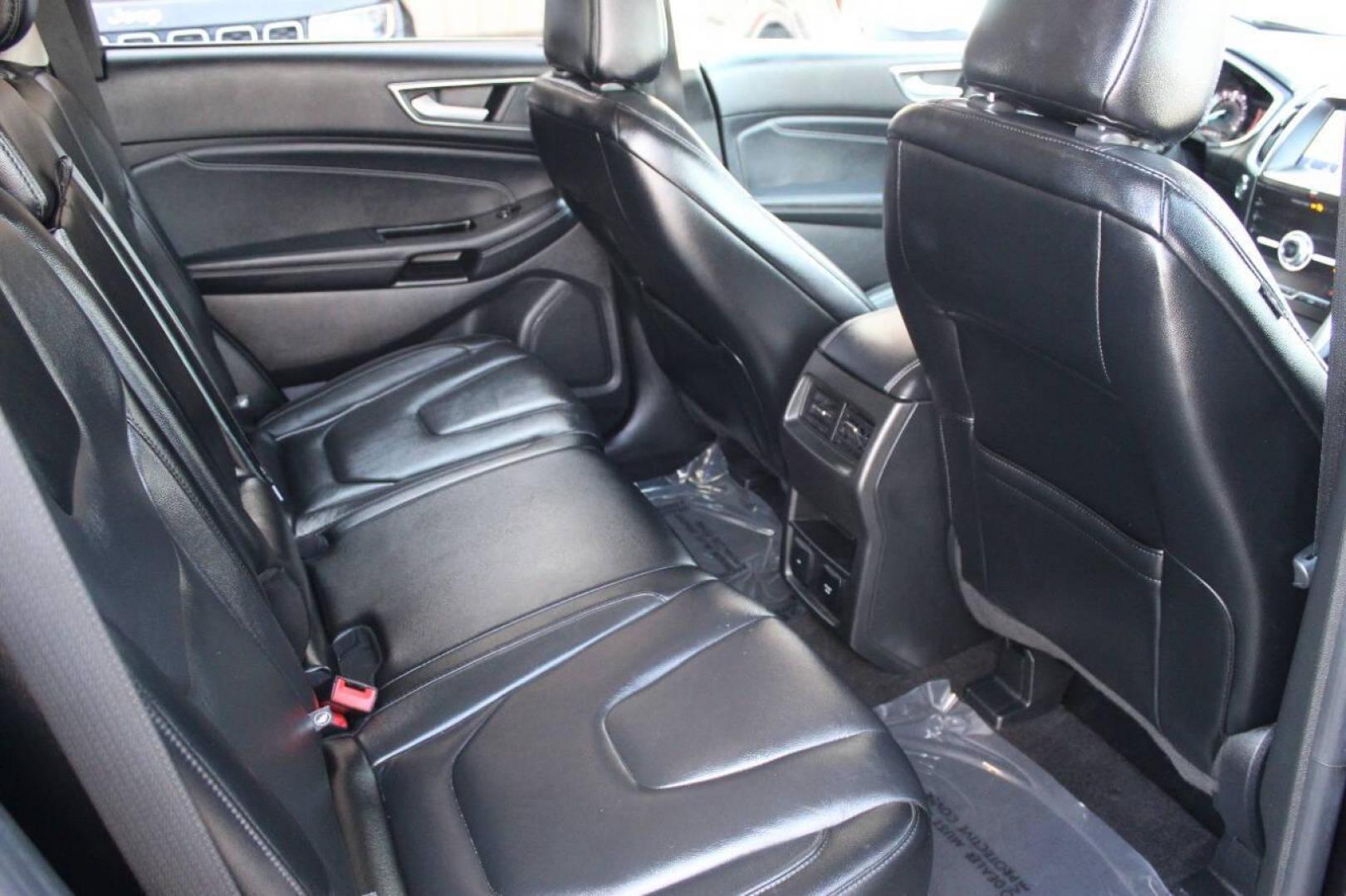 2020 Black Ford Edge Titanium (2FMPK3K96LB) with an 2.0L L4 DOHC 16V engine, 6A transmission, located at 4301 NW 39th , Oklahoma City, OK, 73112, (405) 949-5600, 35.512135, -97.598671 - NO DRIVERS LICENSE - NO FULL COVERAGE INSURANCE - NO CREDIT CHECK. COME ON OVER TO SUPERSPORTS AND TAKE A LOOK AND TEST DRIVE PLEASE GIVE US A CALL AT (405) 949-5600. NO LICENCIA DE MANEJAR - NO SEGURO DE COBERTURA TOTAL - NO VERIFICACION DE CREDITO. POR FAVOR VENGAN A SUPERSPORTS, ECHE - Photo#11
