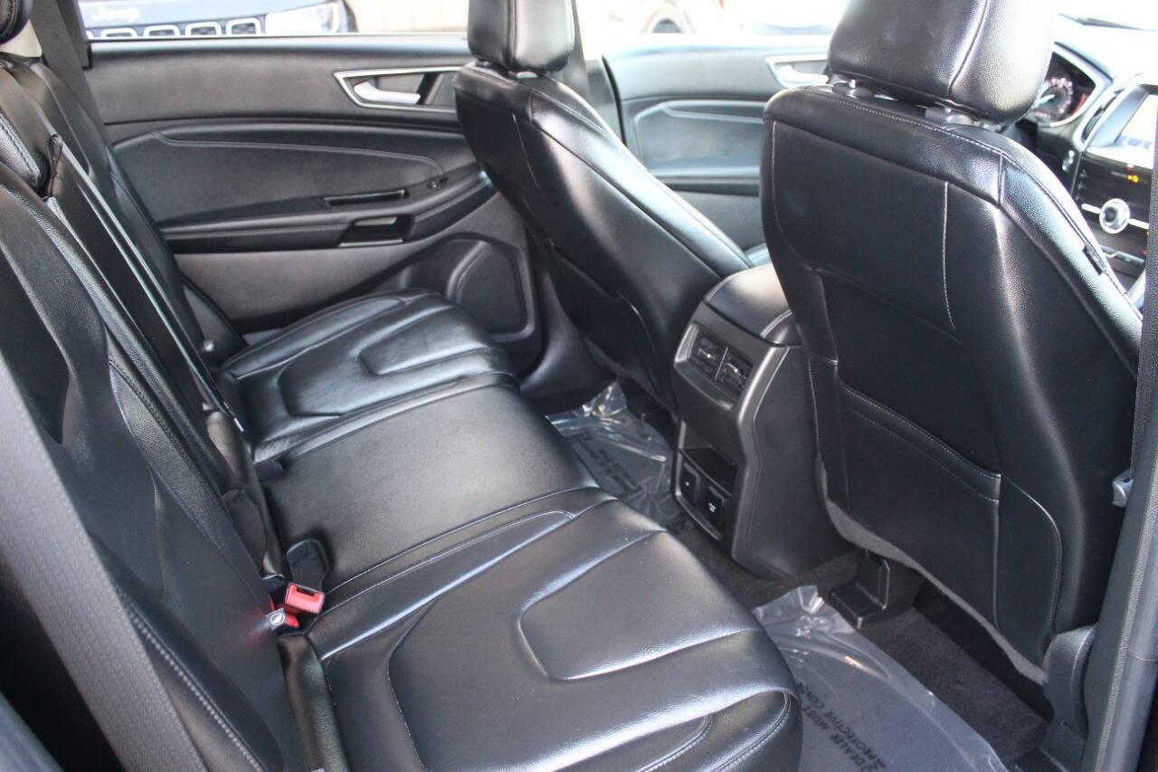 2020 Black Ford Edge Titanium (2FMPK3K96LB) with an 2.0L L4 DOHC 16V engine, 6A transmission, located at 4301 NW 39th , Oklahoma City, OK, 73112, (405) 949-5600, 35.512135, -97.598671 - NO DRIVERS LICENSE - NO FULL COVERAGE INSURANCE - NO CREDIT CHECK. COME ON OVER TO SUPERSPORTS AND TAKE A LOOK AND TEST DRIVE PLEASE GIVE US A CALL AT (405) 949-5600. NO LICENCIA DE MANEJAR - NO SEGURO DE COBERTURA TOTAL - NO VERIFICACION DE CREDITO. POR FAVOR VENGAN A SUPERSPORTS, ECHE - Photo#10