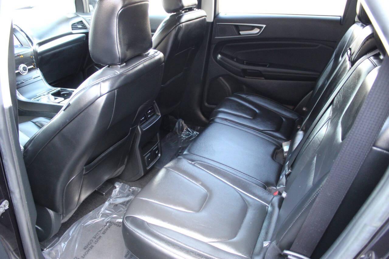 2020 Black Ford Edge Titanium (2FMPK3K96LB) with an 2.0L L4 DOHC 16V engine, 6A transmission, located at 4301 NW 39th , Oklahoma City, OK, 73112, (405) 949-5600, 35.512135, -97.598671 - NO DRIVERS LICENSE - NO FULL COVERAGE INSURANCE - NO CREDIT CHECK. COME ON OVER TO SUPERSPORTS AND TAKE A LOOK AND TEST DRIVE PLEASE GIVE US A CALL AT (405) 949-5600. NO LICENCIA DE MANEJAR - NO SEGURO DE COBERTURA TOTAL - NO VERIFICACION DE CREDITO. POR FAVOR VENGAN A SUPERSPORTS, ECHE - Photo#13