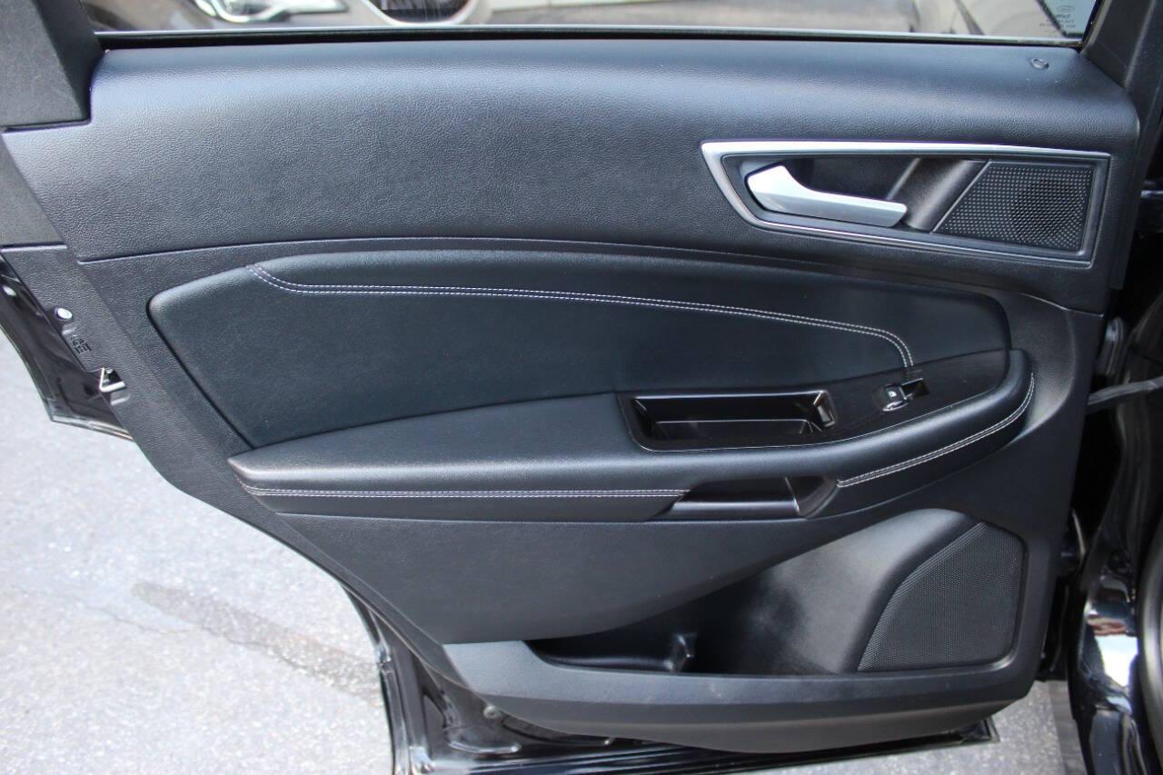 2020 Black Ford Edge Titanium (2FMPK3K96LB) with an 2.0L L4 DOHC 16V engine, 6A transmission, located at 4301 NW 39th , Oklahoma City, OK, 73112, (405) 949-5600, 35.512135, -97.598671 - NO DRIVERS LICENSE - NO FULL COVERAGE INSURANCE - NO CREDIT CHECK. COME ON OVER TO SUPERSPORTS AND TAKE A LOOK AND TEST DRIVE PLEASE GIVE US A CALL AT (405) 949-5600. NO LICENCIA DE MANEJAR - NO SEGURO DE COBERTURA TOTAL - NO VERIFICACION DE CREDITO. POR FAVOR VENGAN A SUPERSPORTS, ECHE - Photo#14