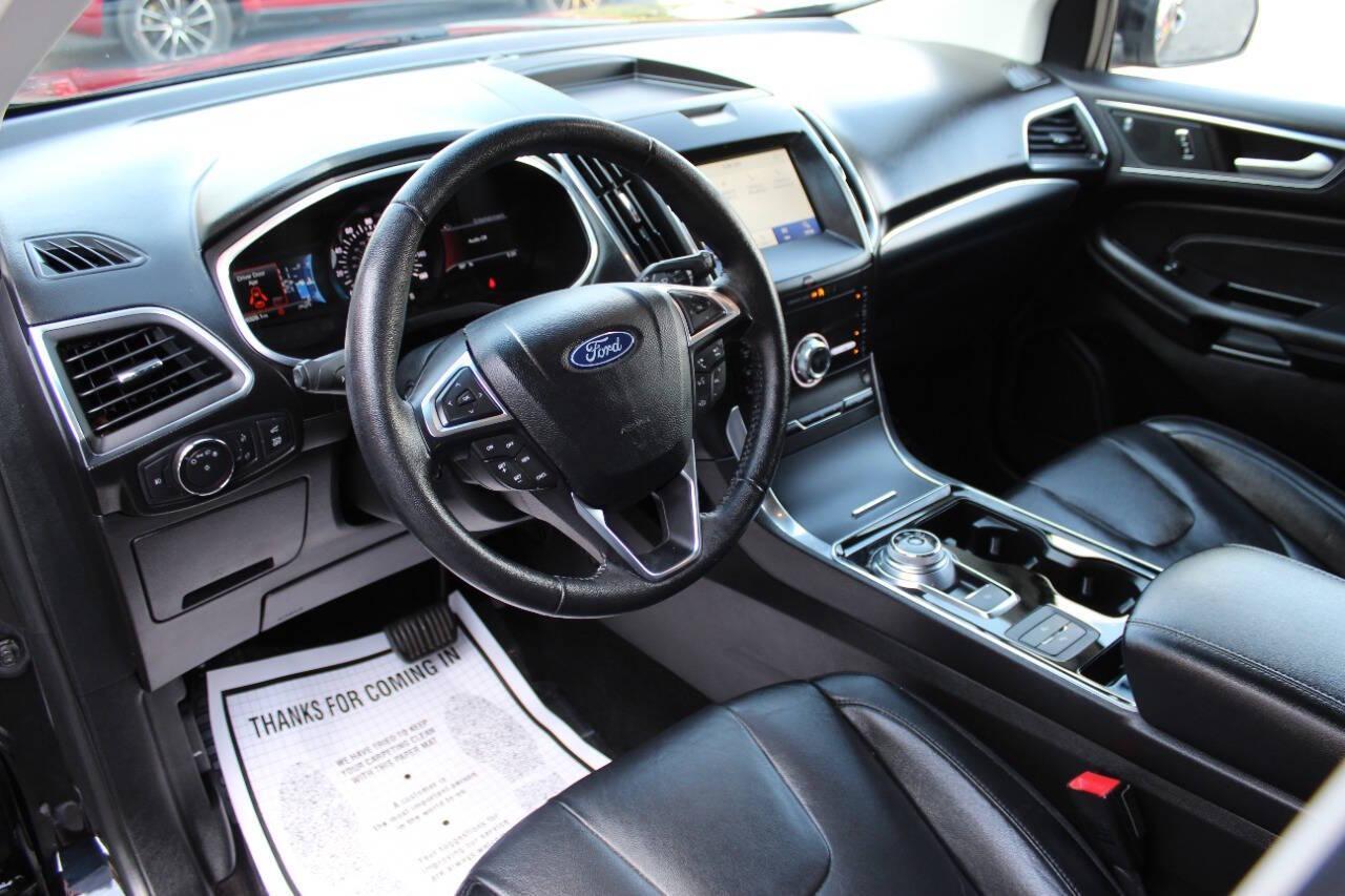 2020 Black Ford Edge Titanium (2FMPK3K96LB) with an 2.0L L4 DOHC 16V engine, 6A transmission, located at 4301 NW 39th , Oklahoma City, OK, 73112, (405) 949-5600, 35.512135, -97.598671 - NO DRIVERS LICENSE - NO FULL COVERAGE INSURANCE - NO CREDIT CHECK. COME ON OVER TO SUPERSPORTS AND TAKE A LOOK AND TEST DRIVE PLEASE GIVE US A CALL AT (405) 949-5600. NO LICENCIA DE MANEJAR - NO SEGURO DE COBERTURA TOTAL - NO VERIFICACION DE CREDITO. POR FAVOR VENGAN A SUPERSPORTS, ECHE - Photo#15