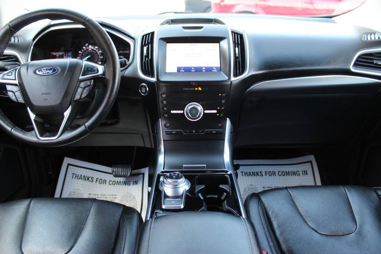 2020 Black Ford Edge Titanium (2FMPK3K96LB) with an 2.0L L4 DOHC 16V engine, 6A transmission, located at 4301 NW 39th , Oklahoma City, OK, 73112, (405) 949-5600, 35.512135, -97.598671 - NO DRIVERS LICENSE - NO FULL COVERAGE INSURANCE - NO CREDIT CHECK. COME ON OVER TO SUPERSPORTS AND TAKE A LOOK AND TEST DRIVE PLEASE GIVE US A CALL AT (405) 949-5600. NO LICENCIA DE MANEJAR - NO SEGURO DE COBERTURA TOTAL - NO VERIFICACION DE CREDITO. POR FAVOR VENGAN A SUPERSPORTS, ECHE - Photo#17