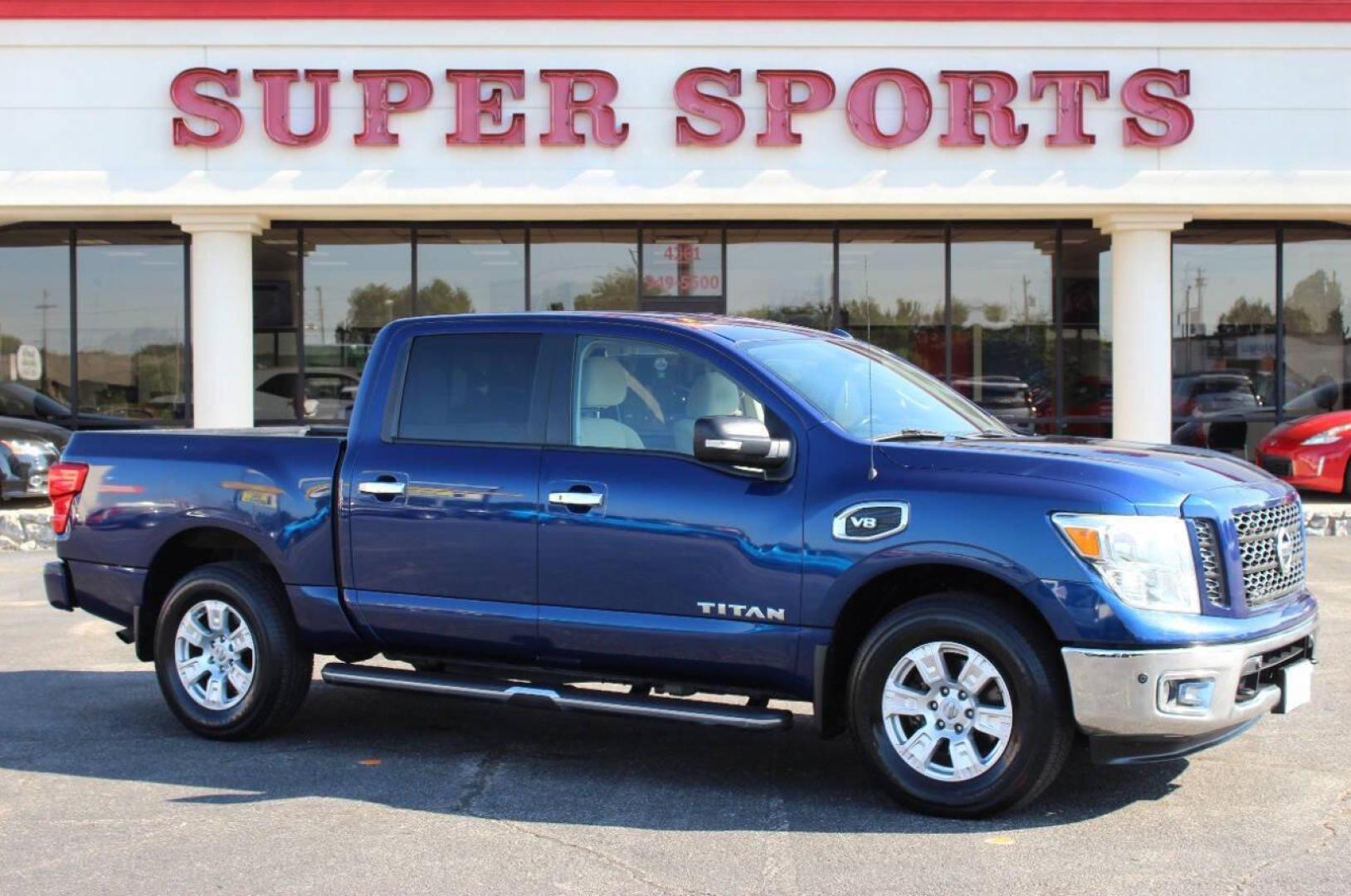 2017 Blue Nissan Titan Platinum Reserve Crew Cab 4WD (1N6AA1E58HN) with an 5.6L V8 DOHC 32V engine, 6A transmission, located at 4301 NW 39th , Oklahoma City, OK, 73112, (405) 949-5600, 35.512135, -97.598671 - NO DRIVERS LICENCE -NO FULL COVERAGE INSURANCE - NO CREDIT CHECK. COME ON OVER TO SUPERSPORTS, TAKE A LOOK AND TEST DRIVE. PLEASE GIVE US A CALL AT (405) 949-5600. NO LICENCIA DE CONDUCIR - NO SEGURO DE COBERTURA TOTAL - NO VERIFICACION DE CREDITO. VISITENOS EN SUPERSPORTS, MIRE NUESTRO - Photo#2