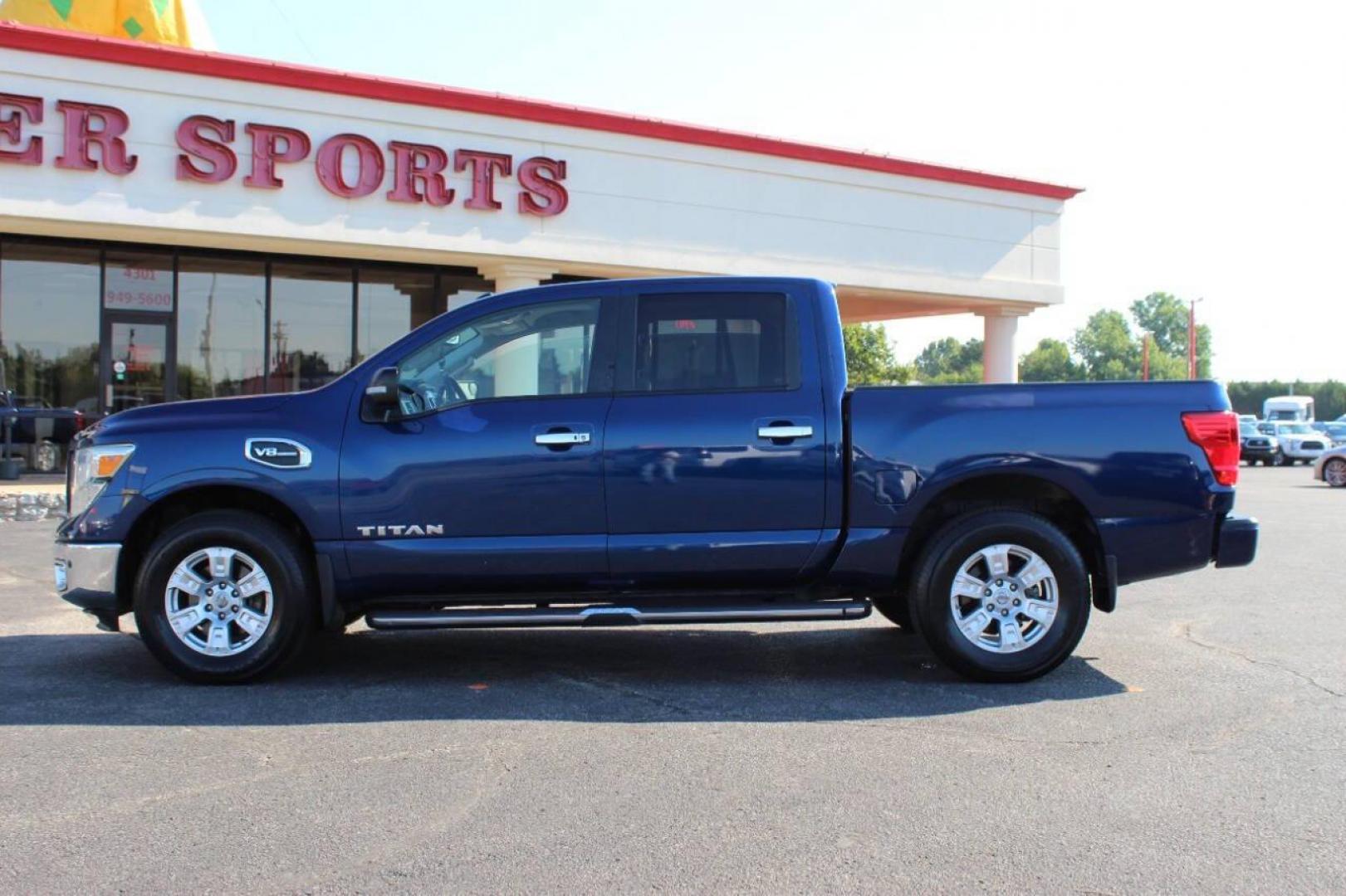 2017 Blue Nissan Titan Platinum Reserve Crew Cab 4WD (1N6AA1E58HN) with an 5.6L V8 DOHC 32V engine, 6A transmission, located at 4301 NW 39th , Oklahoma City, OK, 73112, (405) 949-5600, 35.512135, -97.598671 - NO DRIVERS LICENCE -NO FULL COVERAGE INSURANCE - NO CREDIT CHECK. COME ON OVER TO SUPERSPORTS, TAKE A LOOK AND TEST DRIVE. PLEASE GIVE US A CALL AT (405) 949-5600. NO LICENCIA DE CONDUCIR - NO SEGURO DE COBERTURA TOTAL - NO VERIFICACION DE CREDITO. VISITENOS EN SUPERSPORTS, MIRE NUESTRO - Photo#6