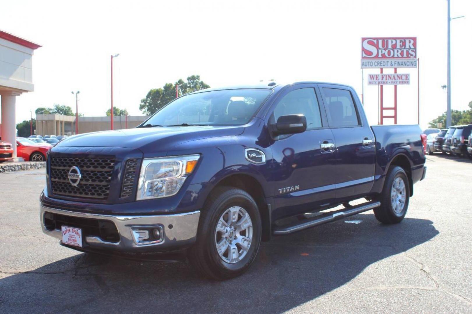 2017 Blue Nissan Titan Platinum Reserve Crew Cab 4WD (1N6AA1E58HN) with an 5.6L V8 DOHC 32V engine, 6A transmission, located at 4301 NW 39th , Oklahoma City, OK, 73112, (405) 949-5600, 35.512135, -97.598671 - NO DRIVERS LICENCE -NO FULL COVERAGE INSURANCE - NO CREDIT CHECK. COME ON OVER TO SUPERSPORTS, TAKE A LOOK AND TEST DRIVE. PLEASE GIVE US A CALL AT (405) 949-5600. NO LICENCIA DE CONDUCIR - NO SEGURO DE COBERTURA TOTAL - NO VERIFICACION DE CREDITO. VISITENOS EN SUPERSPORTS, MIRE NUESTRO - Photo#7