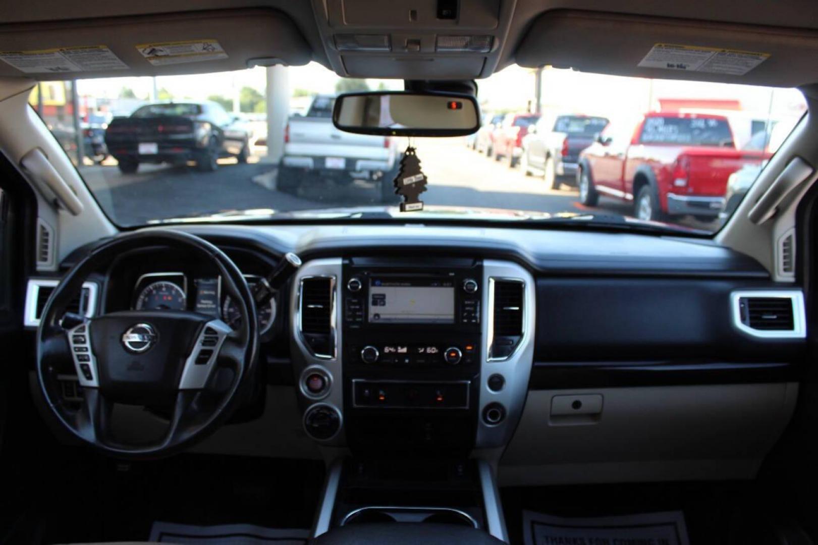 2017 Blue Nissan Titan Platinum Reserve Crew Cab 4WD (1N6AA1E58HN) with an 5.6L V8 DOHC 32V engine, 6A transmission, located at 4301 NW 39th , Oklahoma City, OK, 73112, (405) 949-5600, 35.512135, -97.598671 - NO DRIVERS LICENCE -NO FULL COVERAGE INSURANCE - NO CREDIT CHECK. COME ON OVER TO SUPERSPORTS, TAKE A LOOK AND TEST DRIVE. PLEASE GIVE US A CALL AT (405) 949-5600. NO LICENCIA DE CONDUCIR - NO SEGURO DE COBERTURA TOTAL - NO VERIFICACION DE CREDITO. VISITENOS EN SUPERSPORTS, MIRE NUESTRO - Photo#18