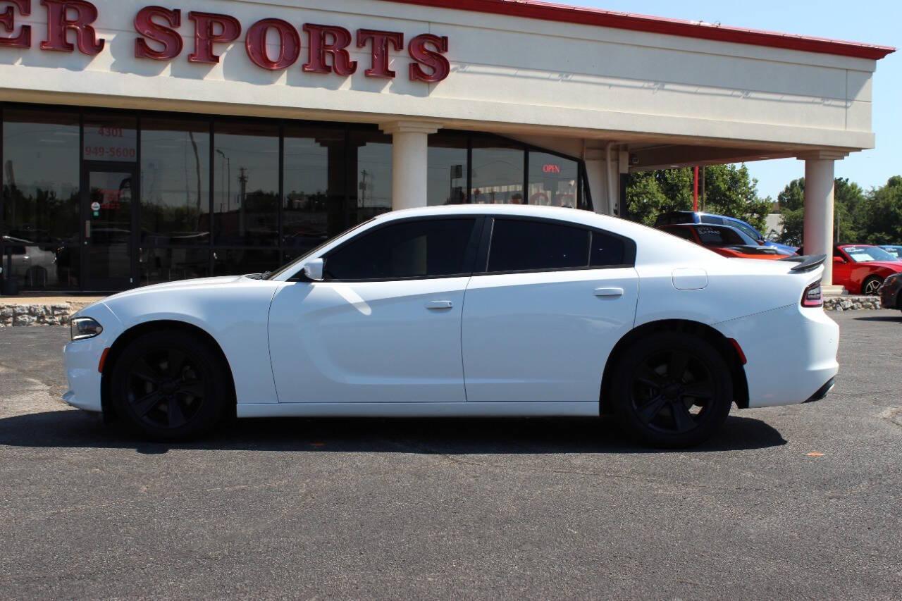 2015 White Dodge Charger SE (2C3CDXBG8FH) with an 3.6L V6 DOHC 24V engine, 8-Speed Automatic transmission, located at 4301 NW 39th , Oklahoma City, OK, 73112, (405) 949-5600, 35.512135, -97.598671 - NO DRIVERS LICENCE -NO FULL COVERAGE INSURANCE - NO CREDIT CHECK. COME ON OVER TO SUPERSPORTS, TAKE A LOOK AND TEST DRIVE. PLEASE GIVE US A CALL AT (405) 949-5600. NO LICENCIA DE CONDUCIR - NO SEGURO DE COBERTURA TOTAL - NO VERIFICACION DE CREDITO. VISITENOS EN SUPERSPORTS, MIRE NUESTRO - Photo#5