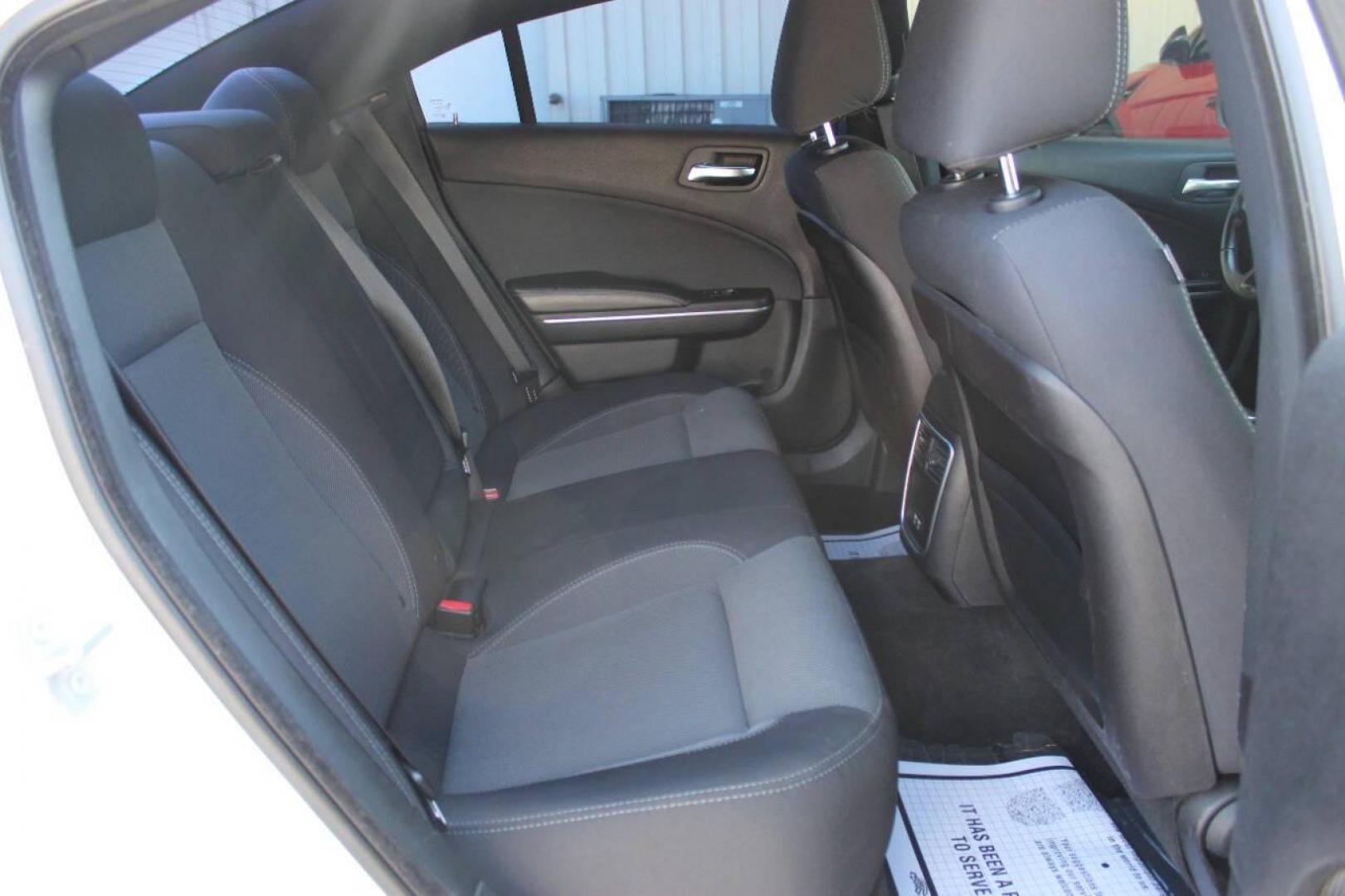 2015 White Dodge Charger SE (2C3CDXBG8FH) with an 3.6L V6 DOHC 24V engine, 8-Speed Automatic transmission, located at 4301 NW 39th , Oklahoma City, OK, 73112, (405) 949-5600, 35.512135, -97.598671 - Photo#11